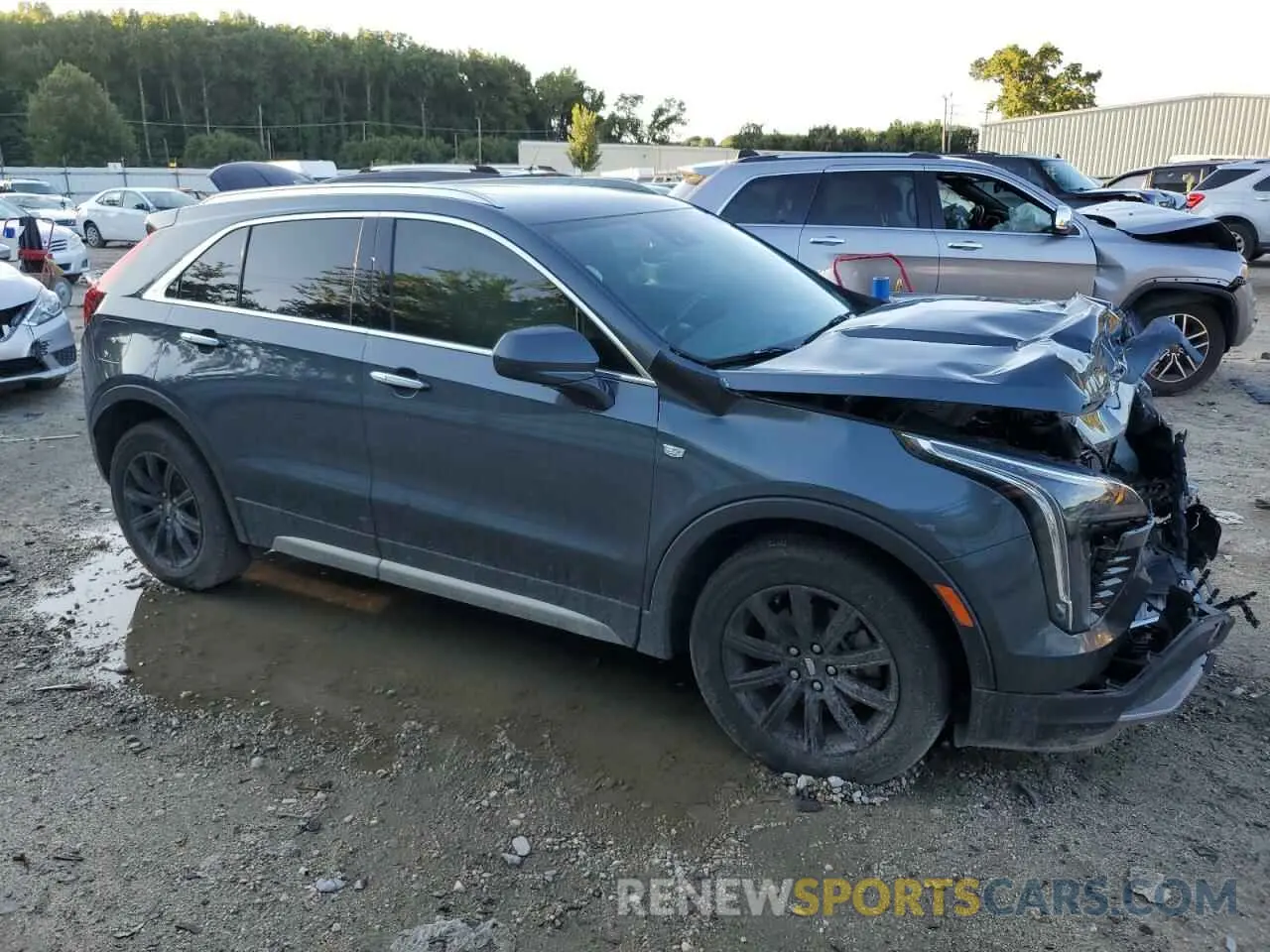 4 Photograph of a damaged car 1GYFZCR47KF123621 CADILLAC XT4 2019