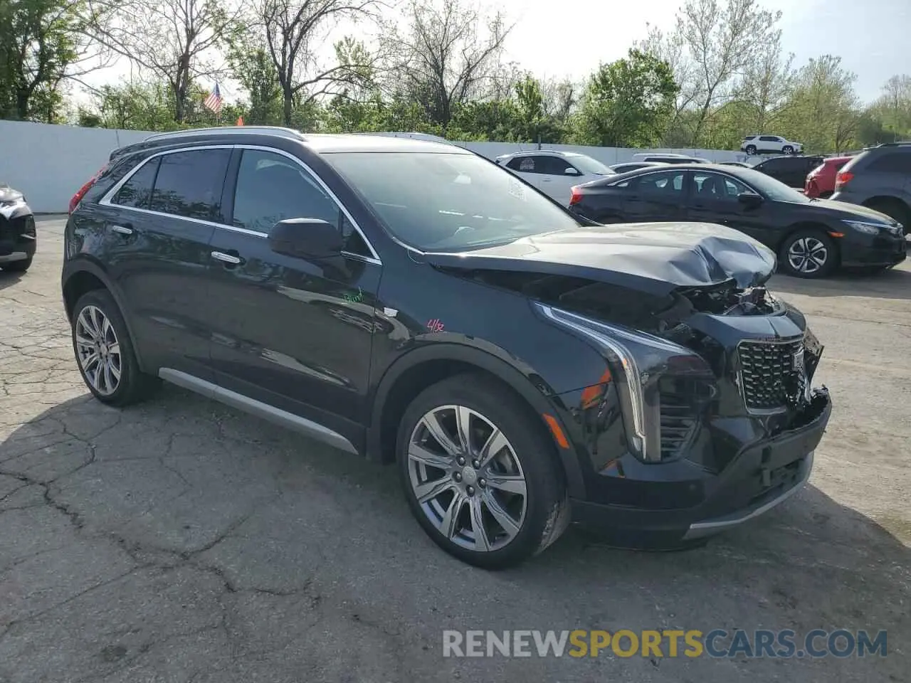 4 Photograph of a damaged car 1GYFZCR4XKF100124 CADILLAC XT4 2019