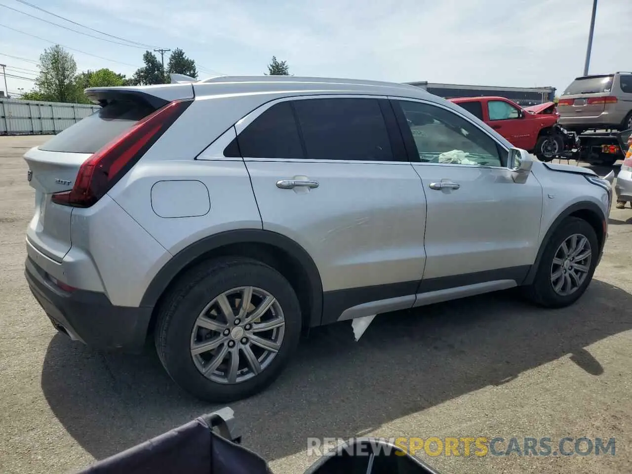 3 Photograph of a damaged car 1GYFZDR48KF194395 CADILLAC XT4 2019