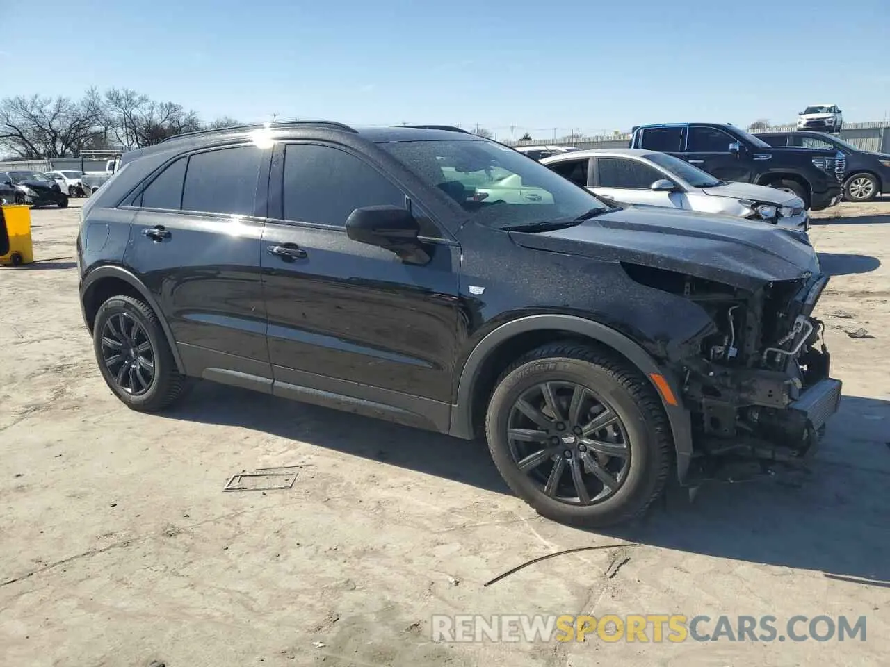 4 Фотография поврежденного автомобиля 1GYFZER49KF199403 CADILLAC XT4 2019