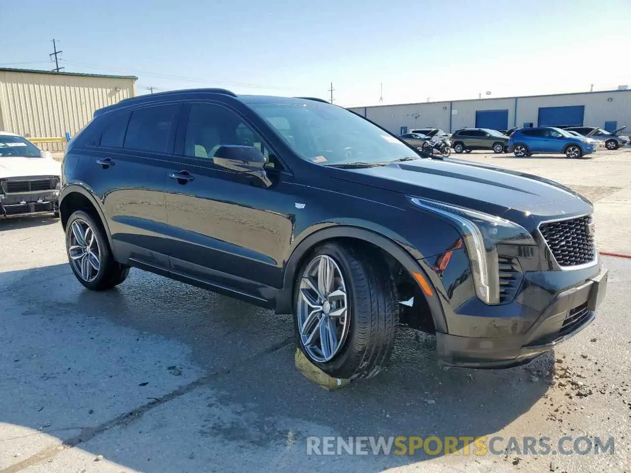 4 Photograph of a damaged car 1GYFZER40LF141634 CADILLAC XT4 2020