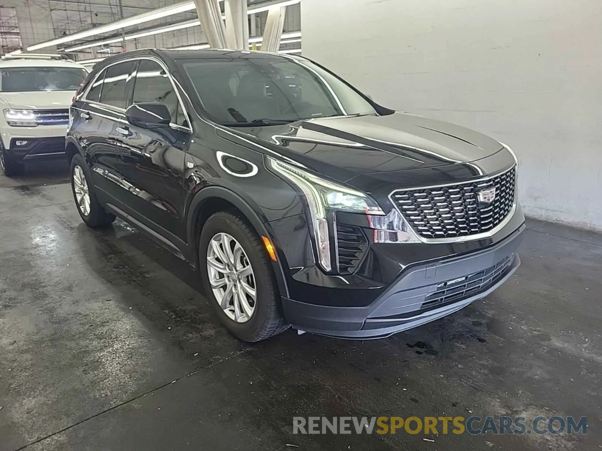 25 Photograph of a damaged car 1GYAZAR43MF080090 CADILLAC XT4 2021