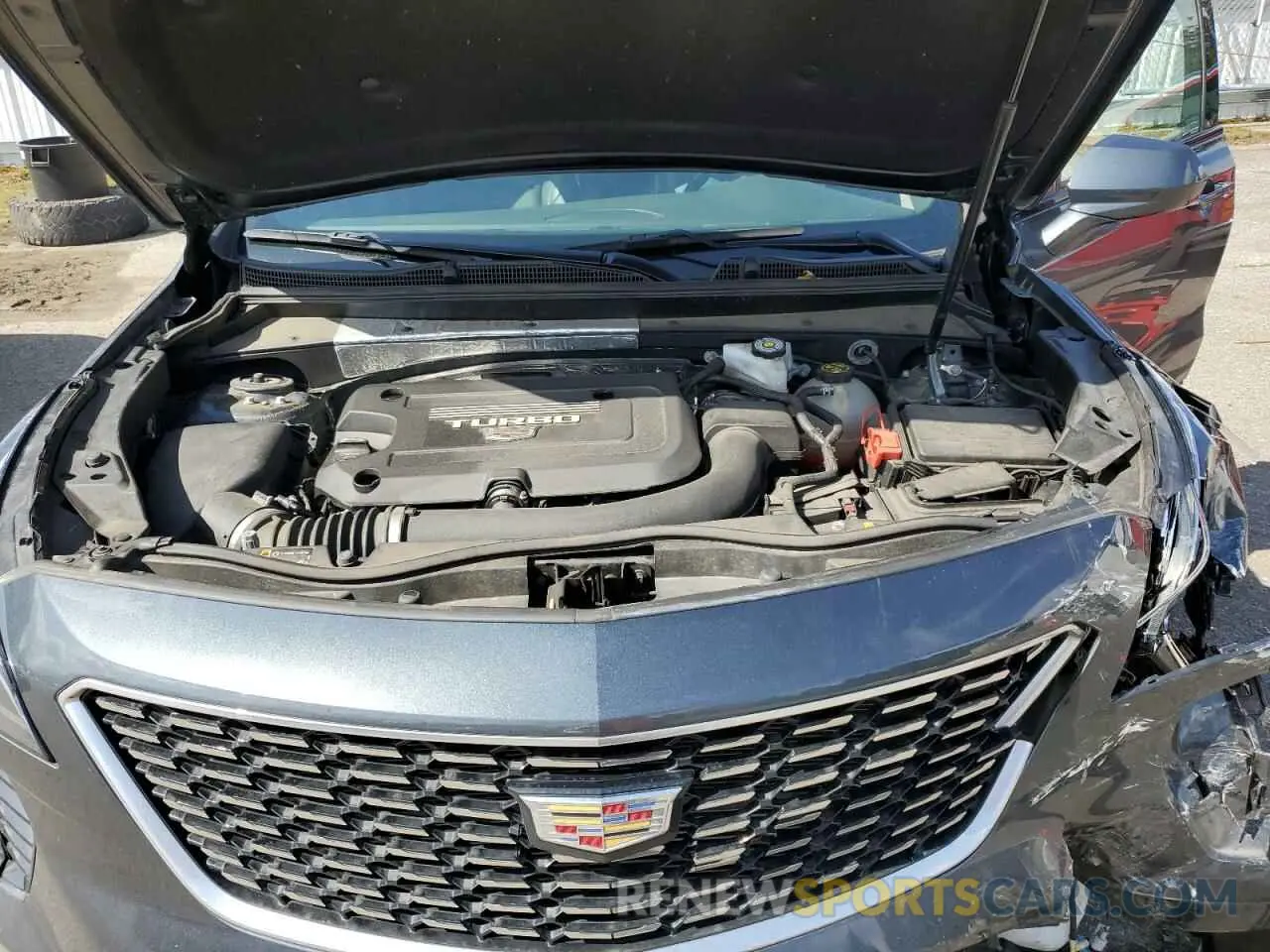 12 Photograph of a damaged car 1GYFZBR48MF034573 CADILLAC XT4 2021