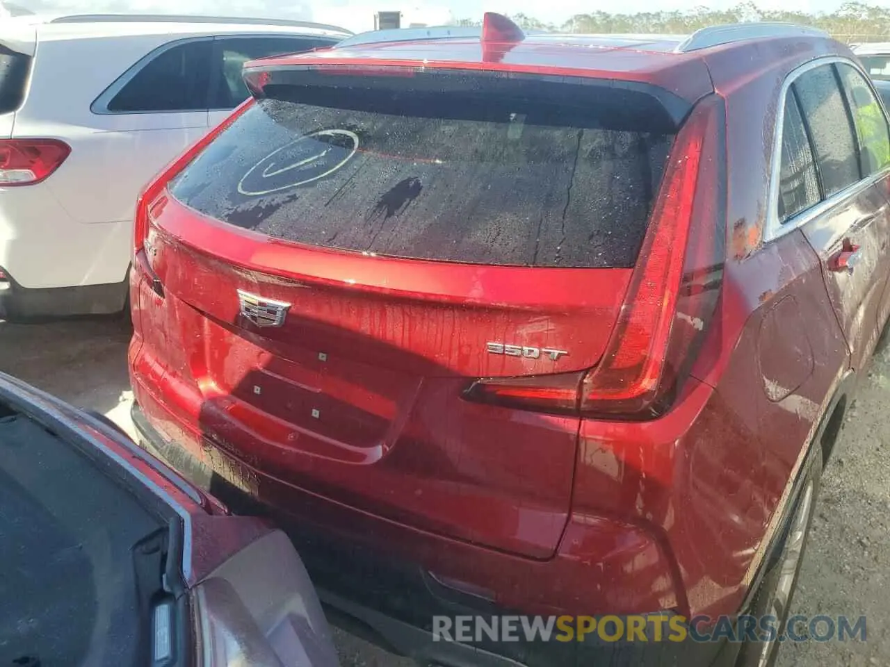 6 Photograph of a damaged car 1GYFZCR41MF018334 CADILLAC XT4 2021