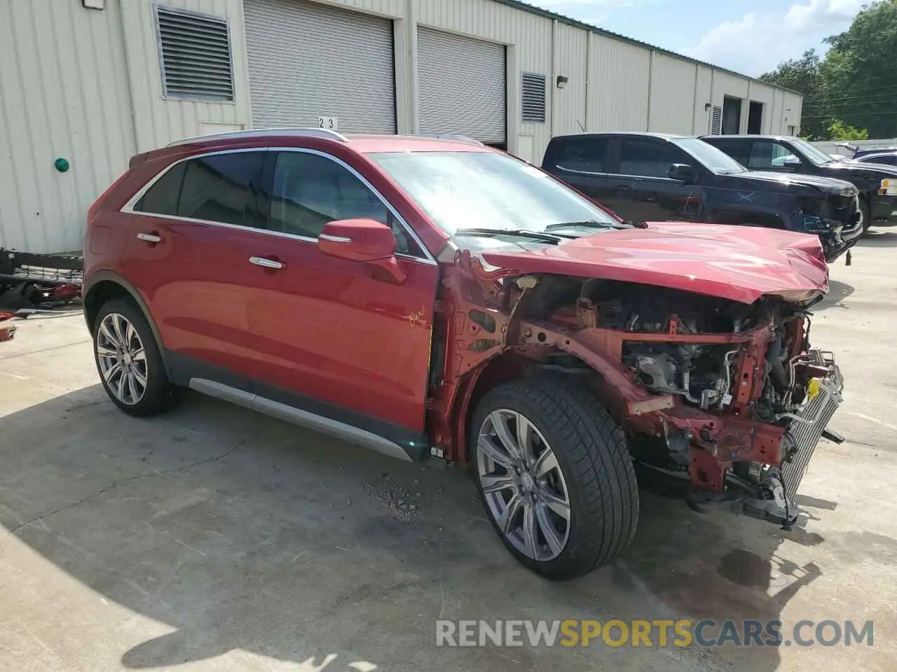 4 Photograph of a damaged car 1GYFZDR40MF001255 CADILLAC XT4 2021