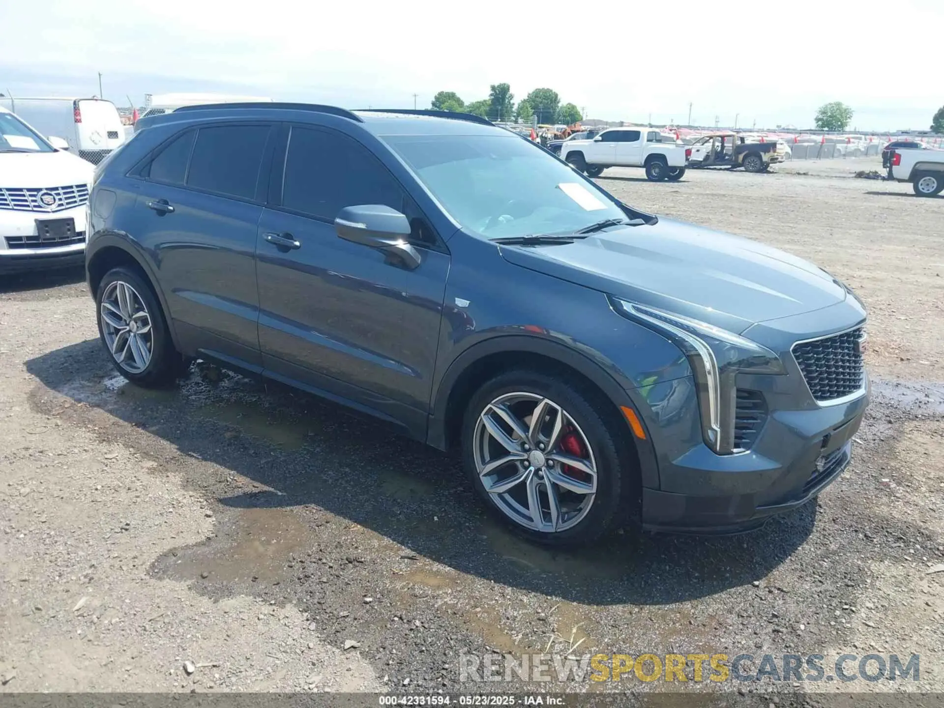 1 Photograph of a damaged car 1GYFZER41MF079193 CADILLAC XT4 2021