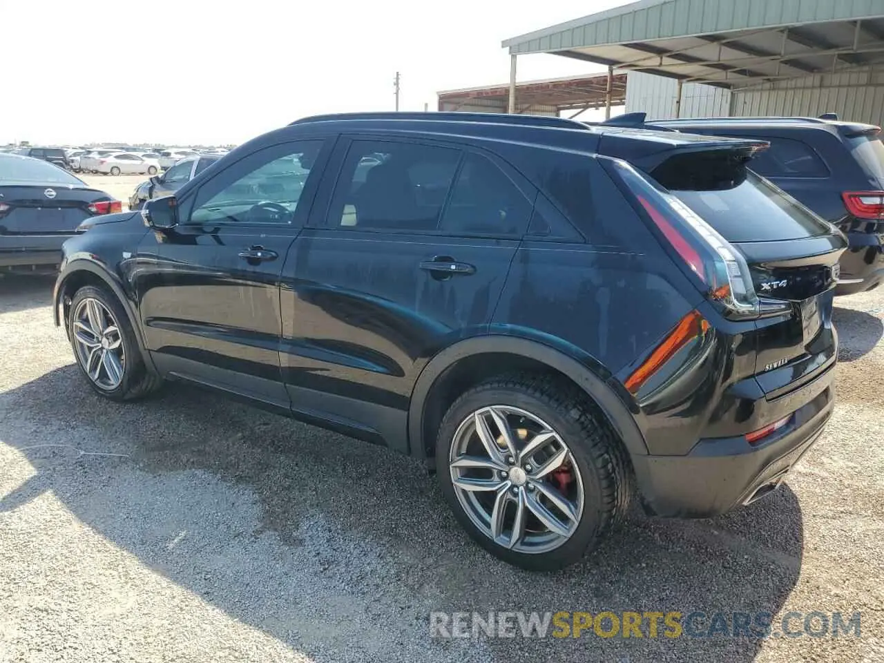 2 Photograph of a damaged car 1GYFZER44MF015908 CADILLAC XT4 2021
