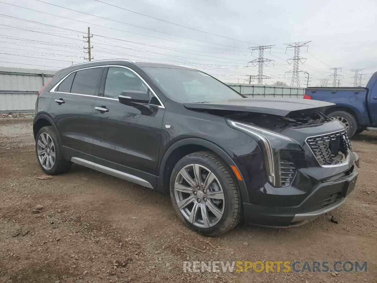 4 Photograph of a damaged car 1GYFZDR43NF132553 CADILLAC XT4 2022