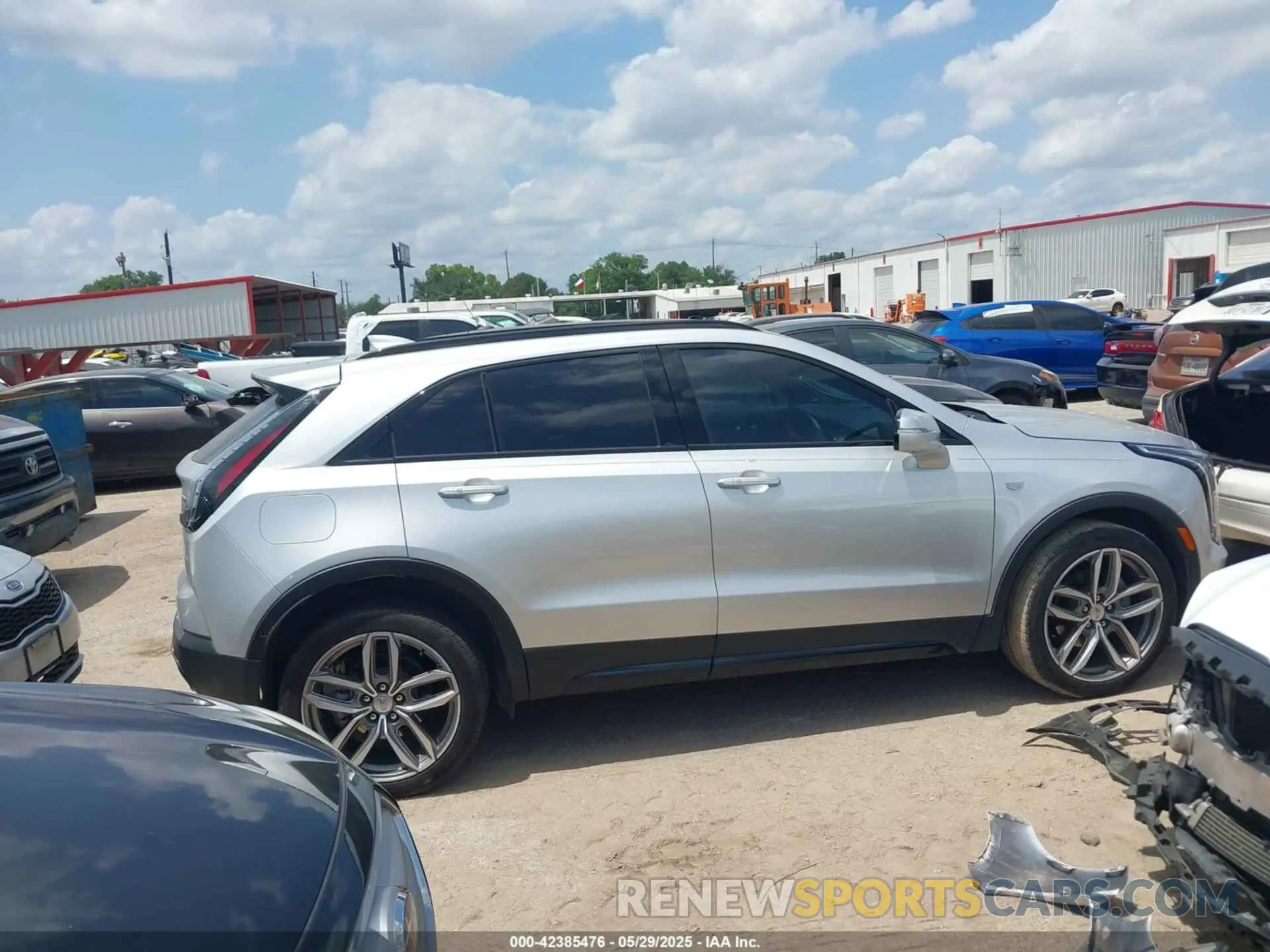 12 Фотография поврежденного автомобиля 1GYFZER43NF145874 CADILLAC XT4 2022