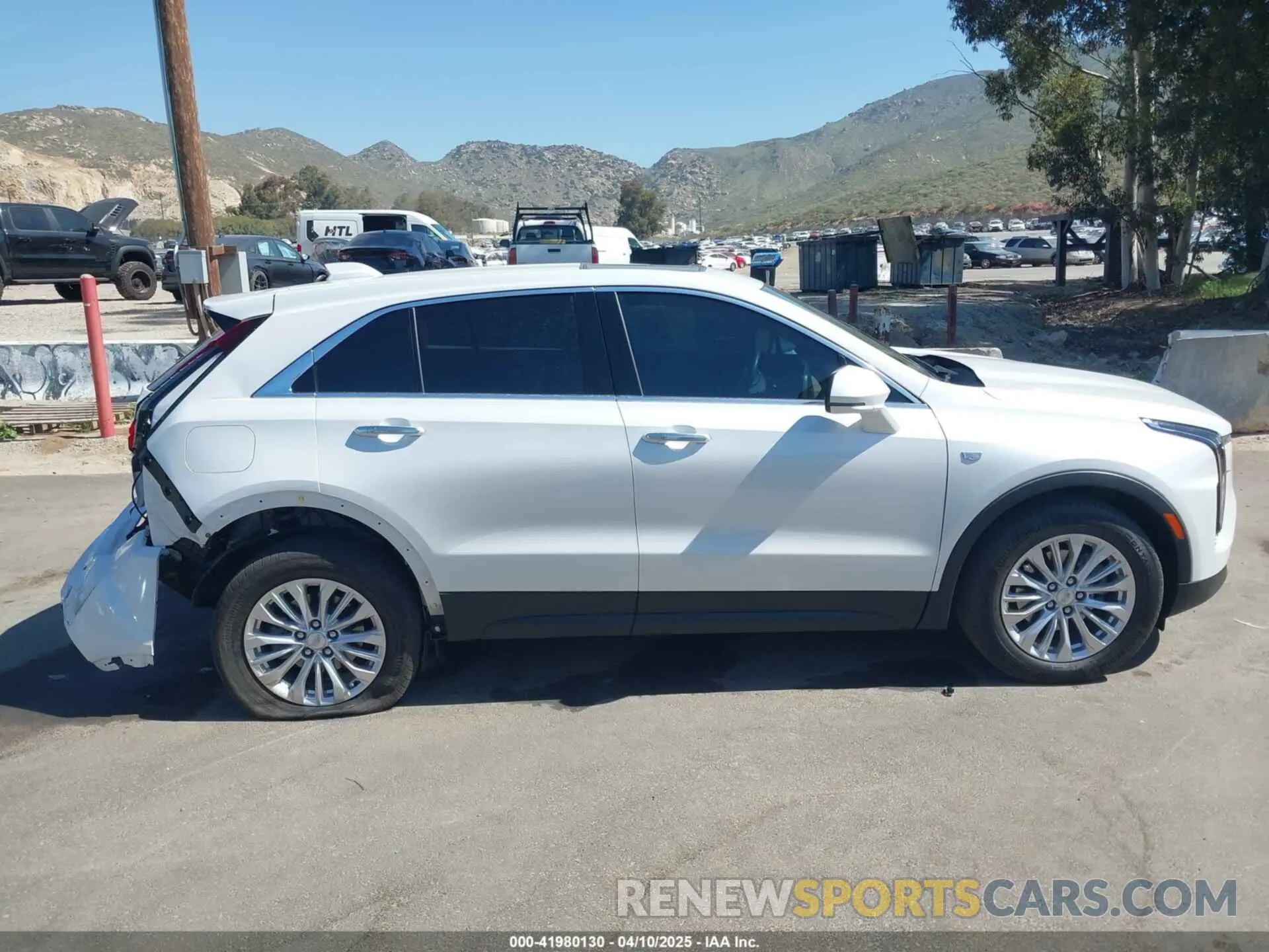 13 Photograph of a damaged car 1GYAZAR42RF168331 CADILLAC XT4 2024