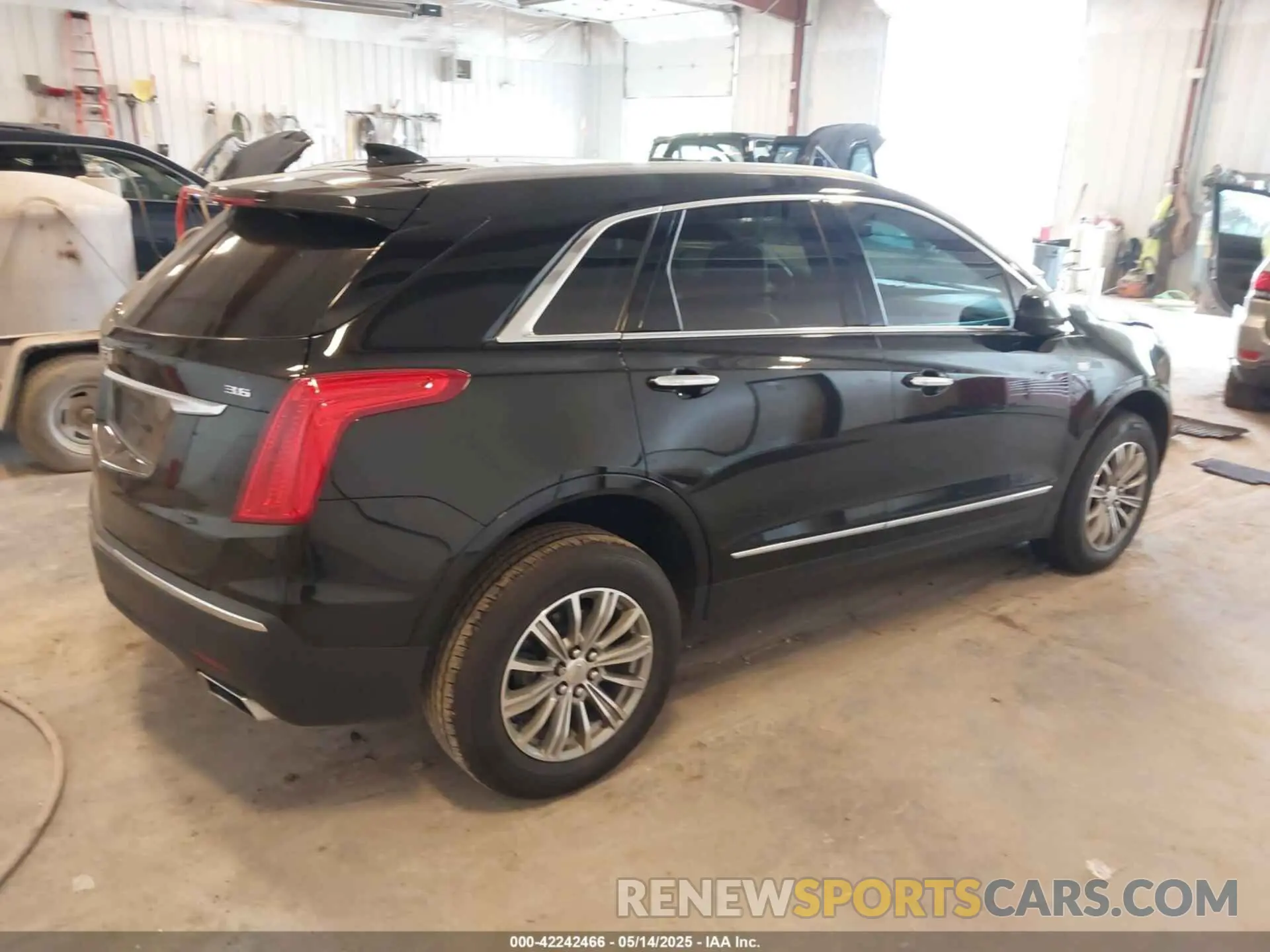 4 Photograph of a damaged car 1GYKNCRS2KZ197052 CADILLAC XT5 2019