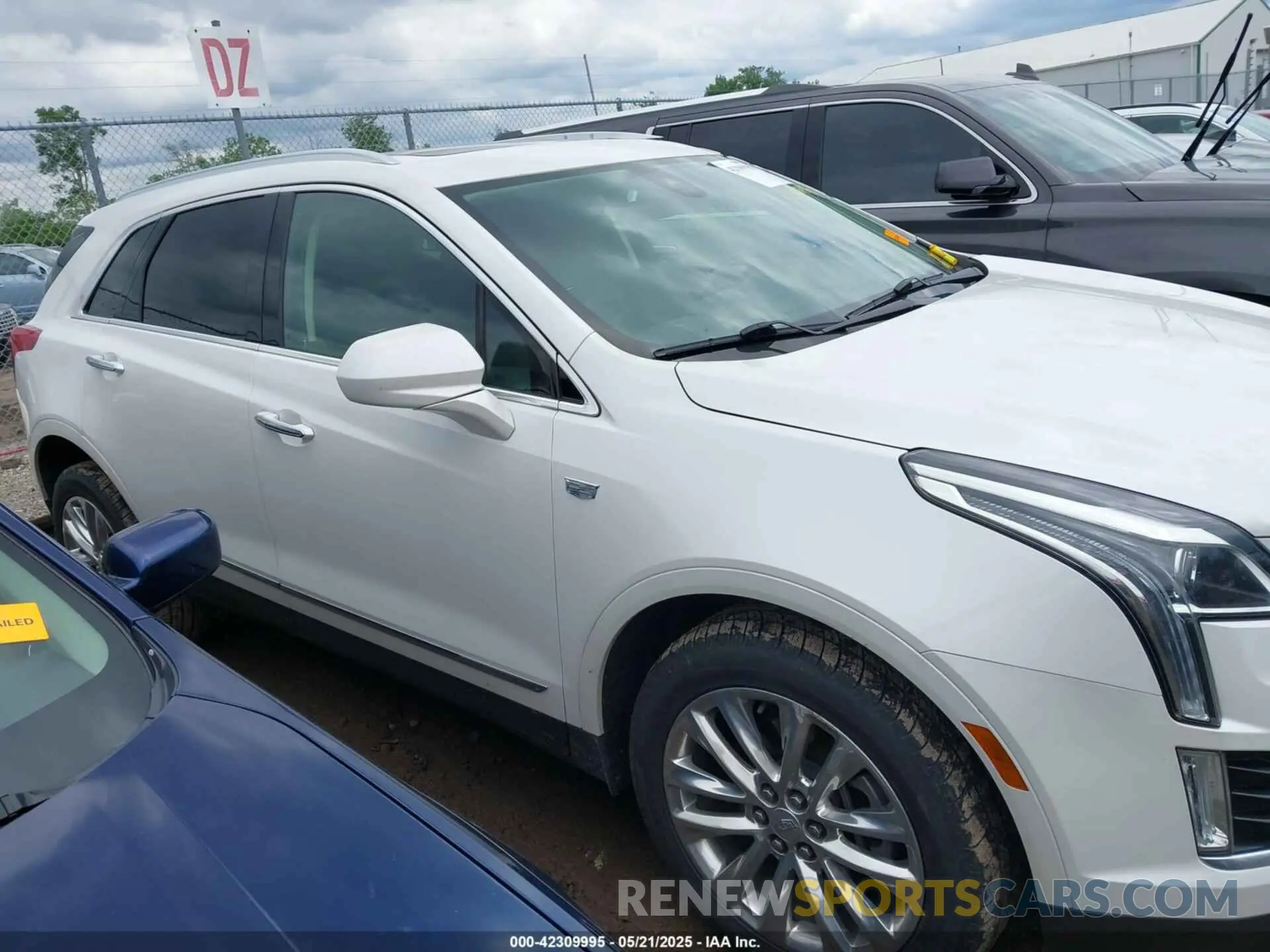 13 Photograph of a damaged car 1GYKNCRS5KZ102659 CADILLAC XT5 2019
