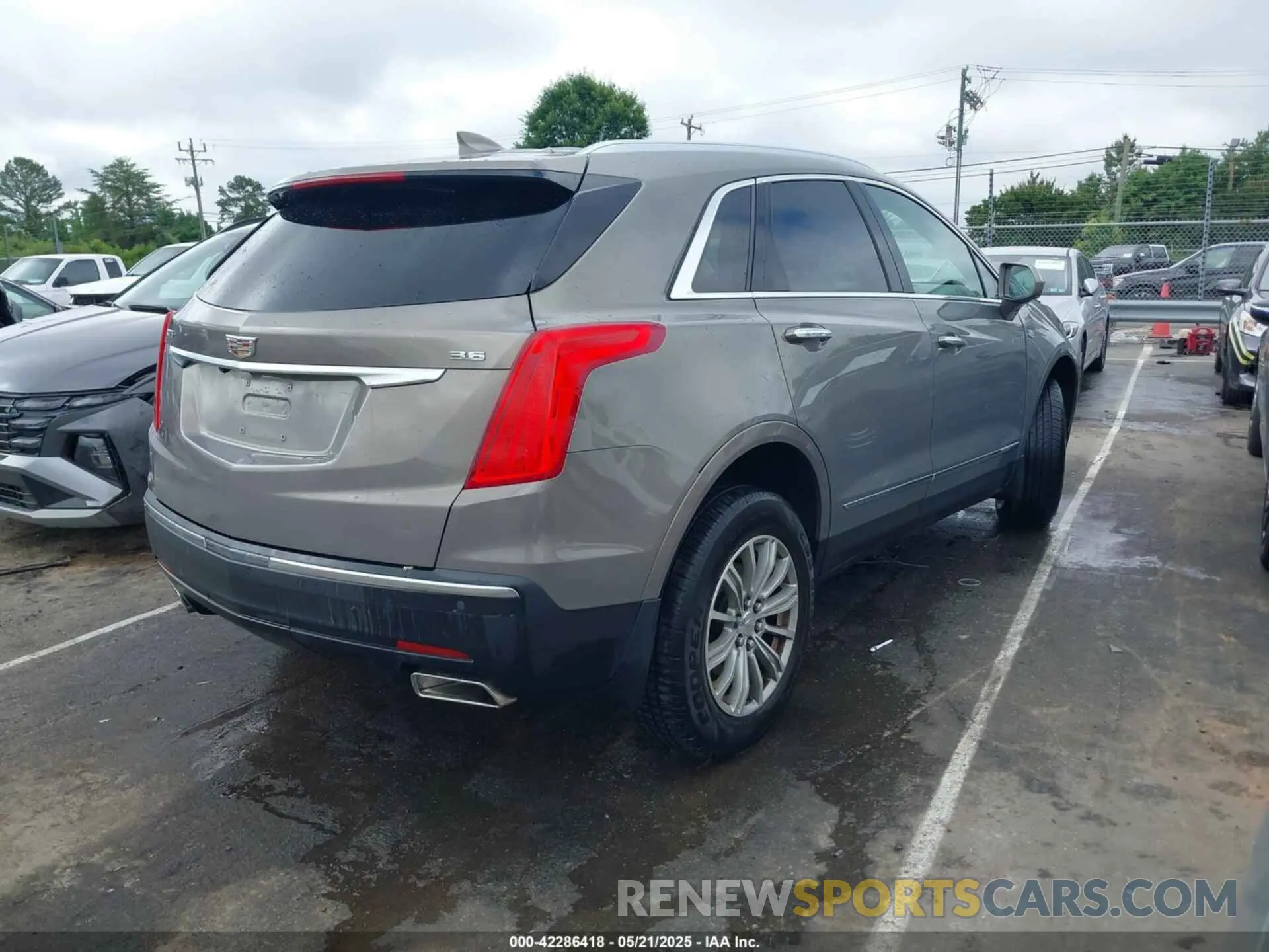 4 Photograph of a damaged car 1GYKNCRS9KZ198215 CADILLAC XT5 2019