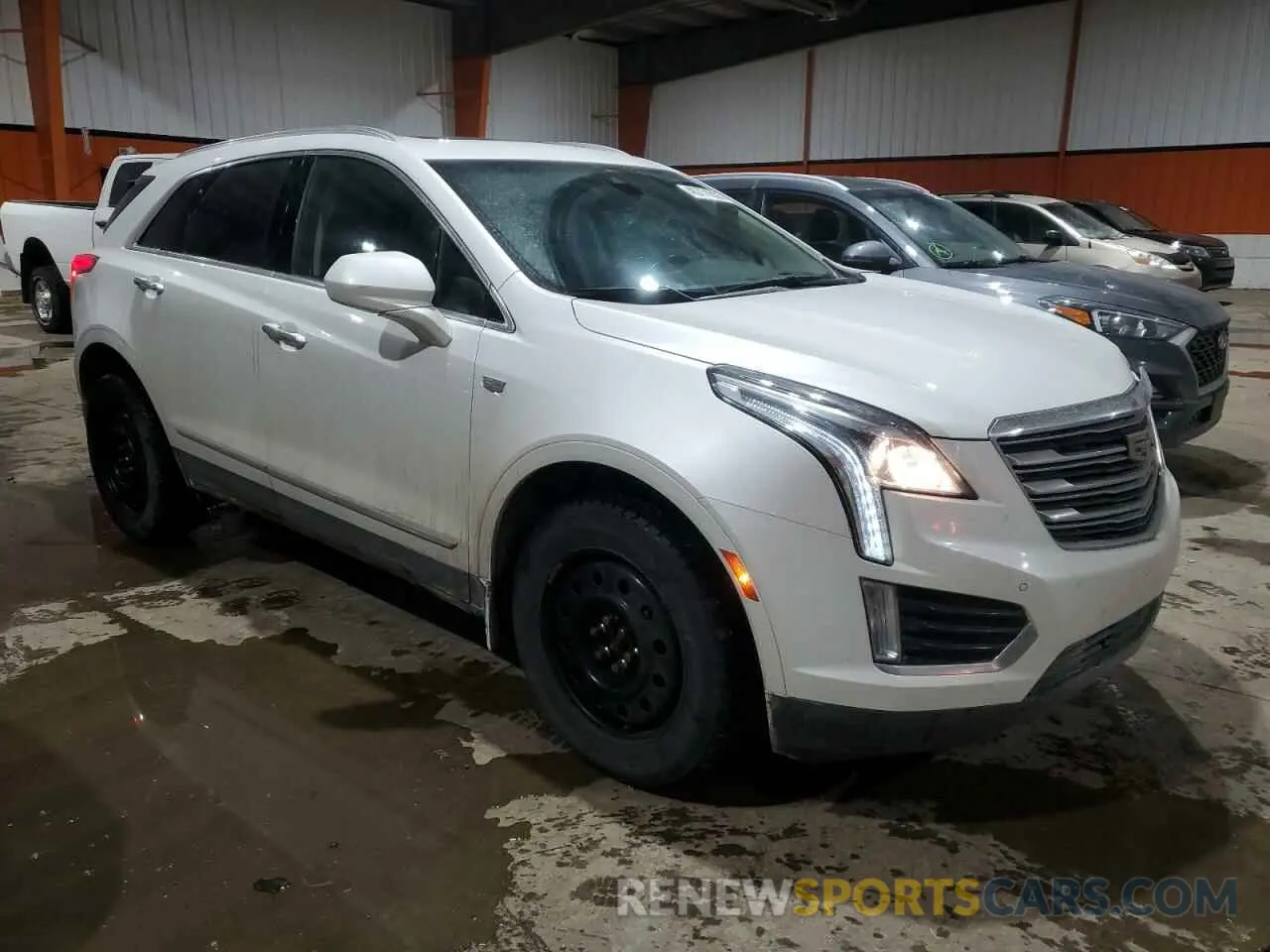 4 Photograph of a damaged car 1GYKNDRSXKZ238002 CADILLAC XT5 2019