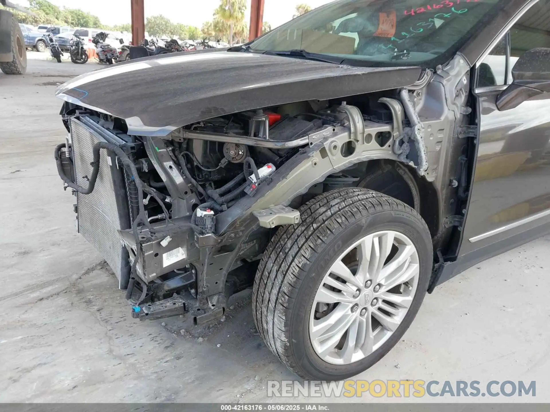 19 Photograph of a damaged car 1GYKNERS9KZ190112 CADILLAC XT5 2019