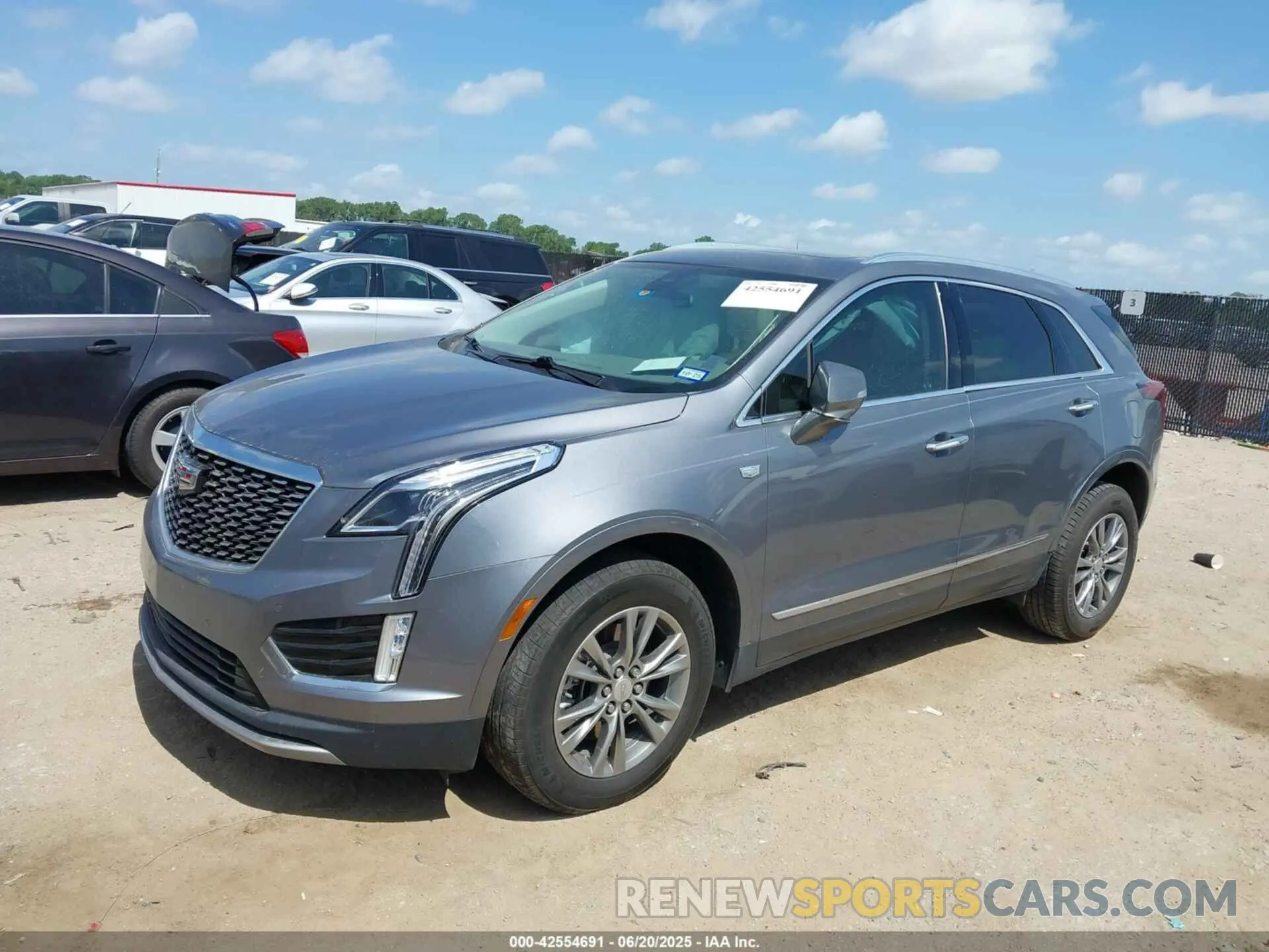 2 Фотография поврежденного автомобиля 1GYKNCR46MZ174474 CADILLAC XT5 2021