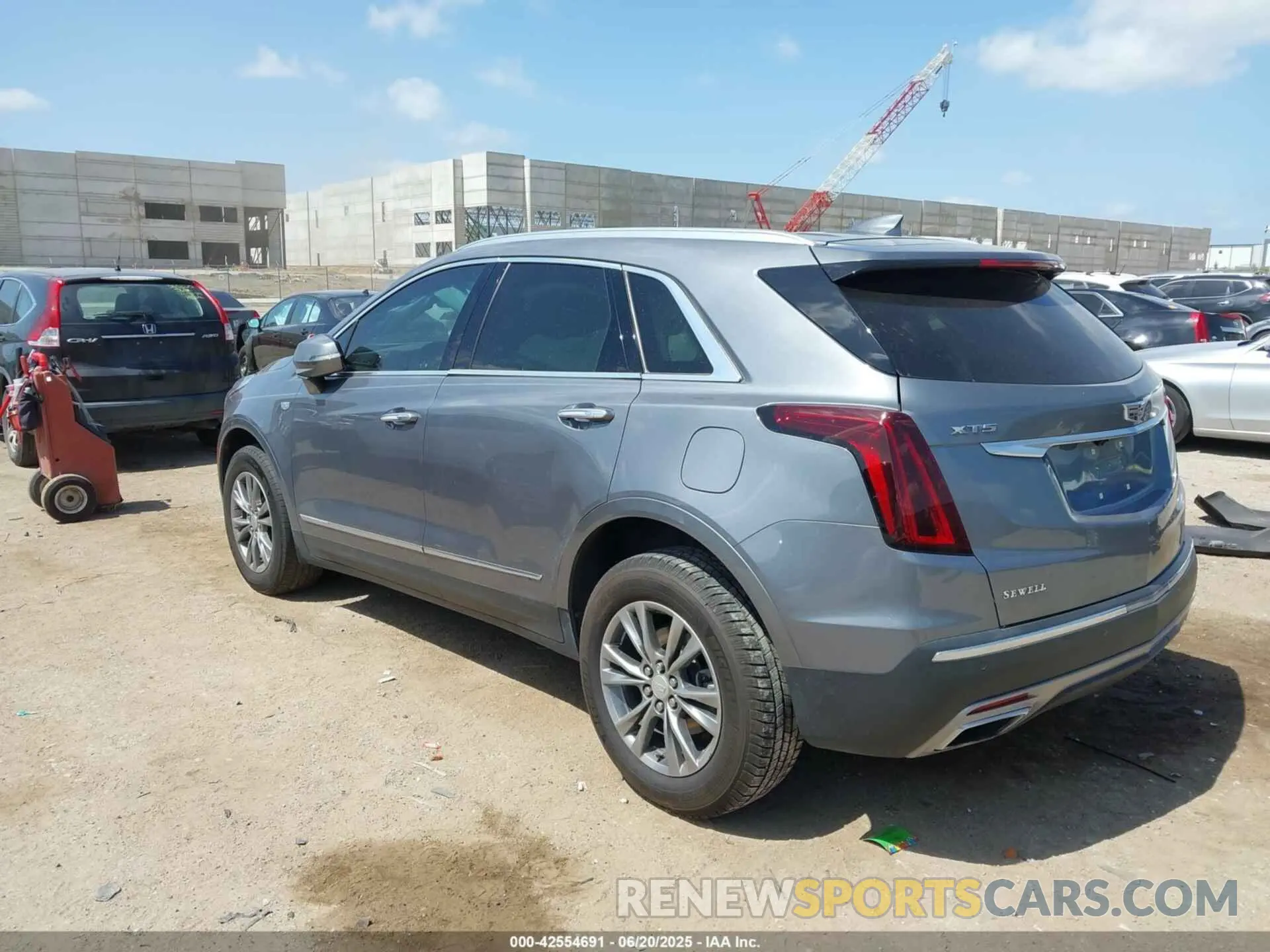3 Фотография поврежденного автомобиля 1GYKNCR46MZ174474 CADILLAC XT5 2021