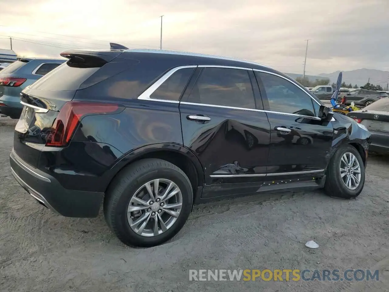 3 Фотография поврежденного автомобиля 1GYKNCRS4MZ121643 CADILLAC XT5 2021