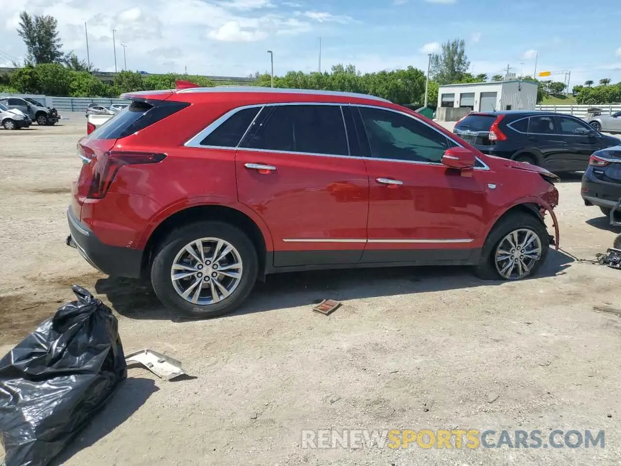 3 Фотография поврежденного автомобиля 1GYKNCRS7NZ158008 CADILLAC XT5 2022