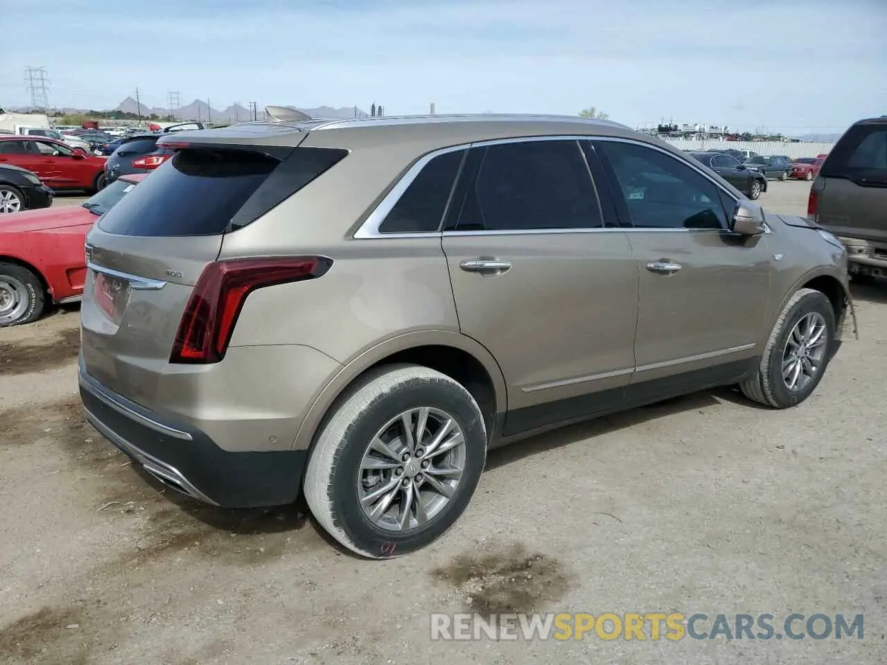 3 Фотография поврежденного автомобиля 1GYKNCRS9NZ180043 CADILLAC XT5 2022
