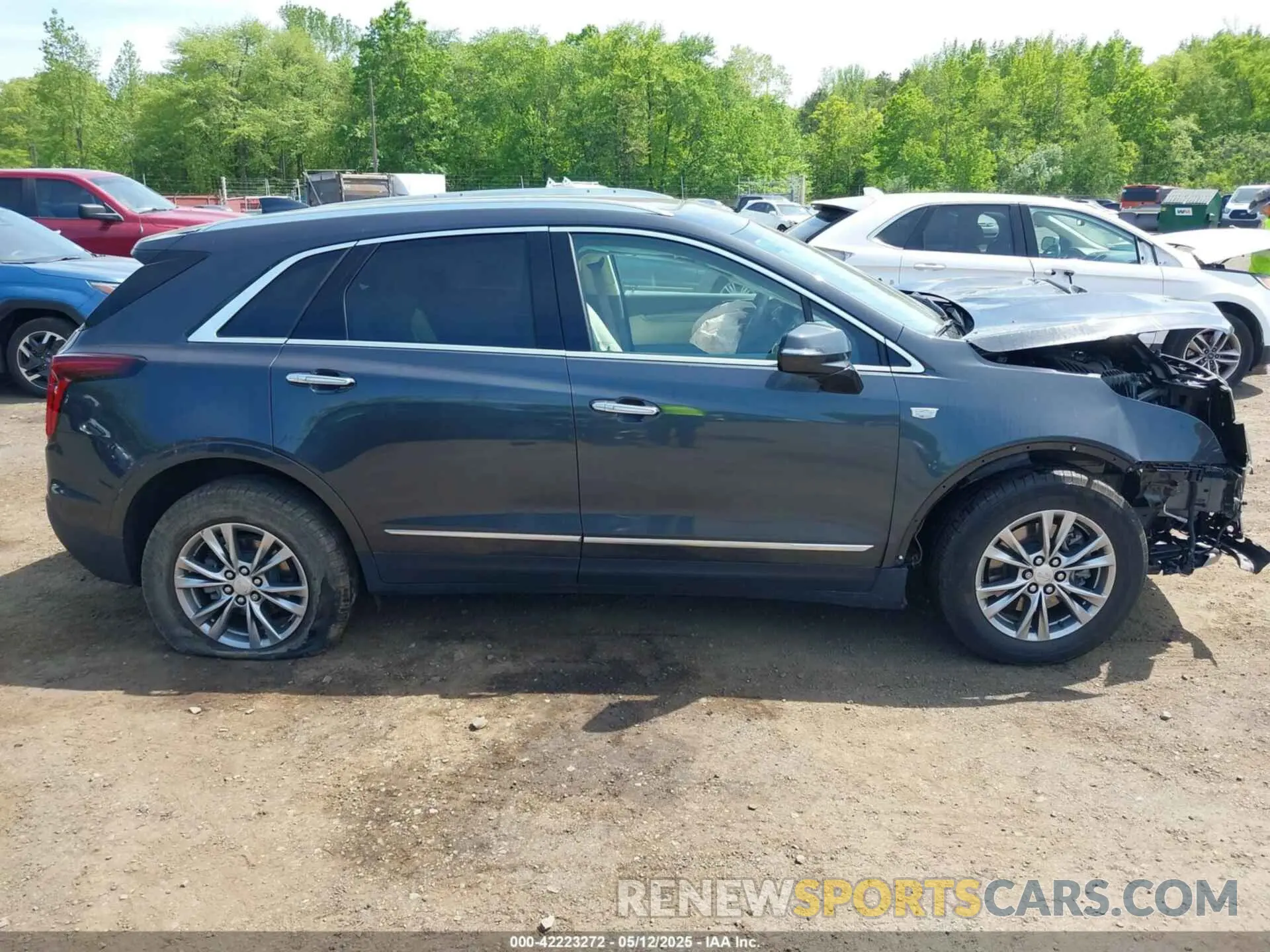 13 Photograph of a damaged car 1GYKNDRS3PZ120963 CADILLAC XT5 2023