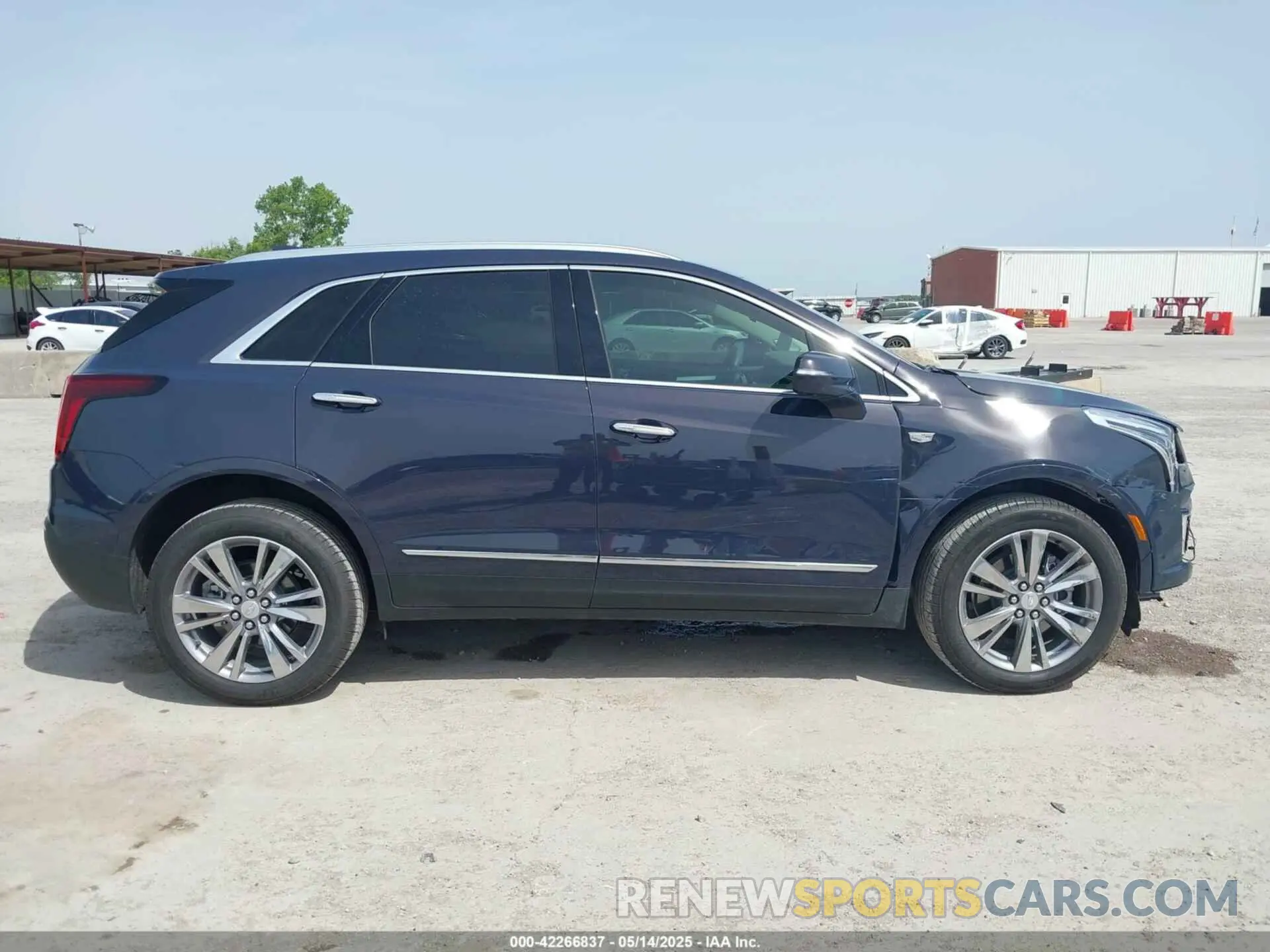 14 Photograph of a damaged car 1GYKNCR41RZ738779 CADILLAC XT5 2024