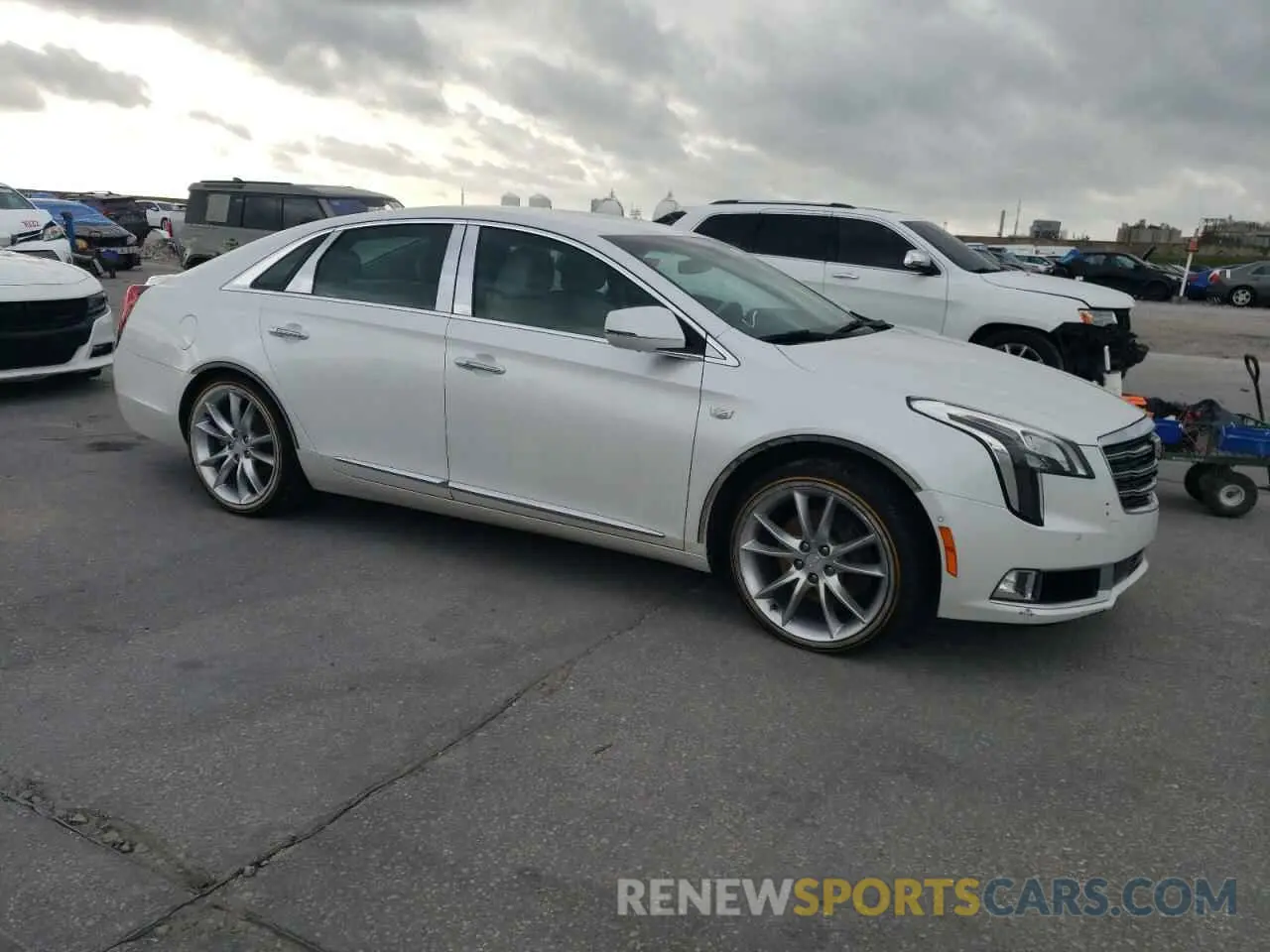 4 Photograph of a damaged car 2G61P5S3XK9138886 CADILLAC XTS 2019