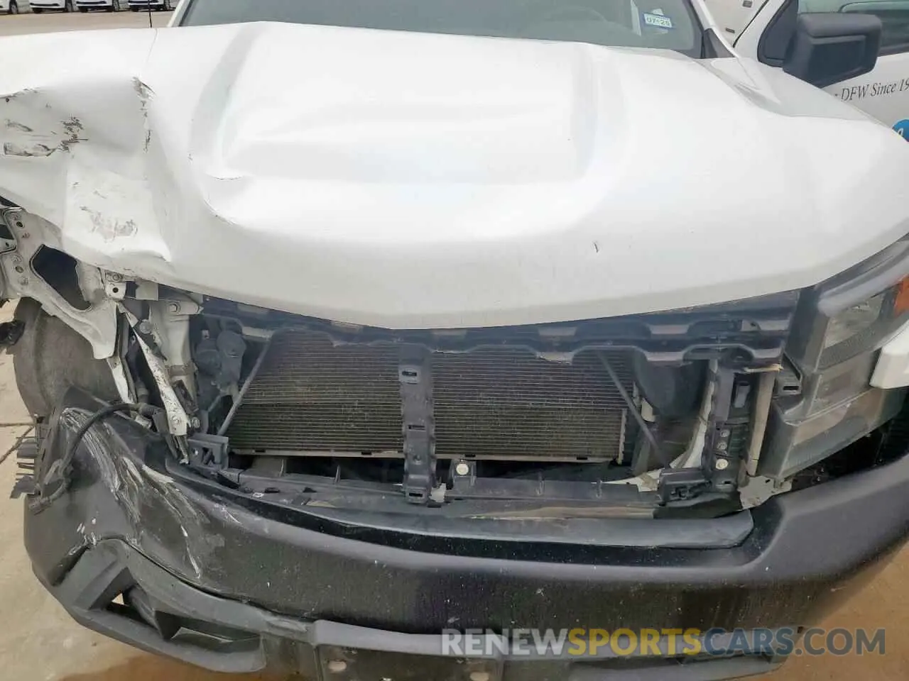 11 Photograph of a damaged car 1GCRWAEH5KZ398833 CHEVROLET ALL Models 2019