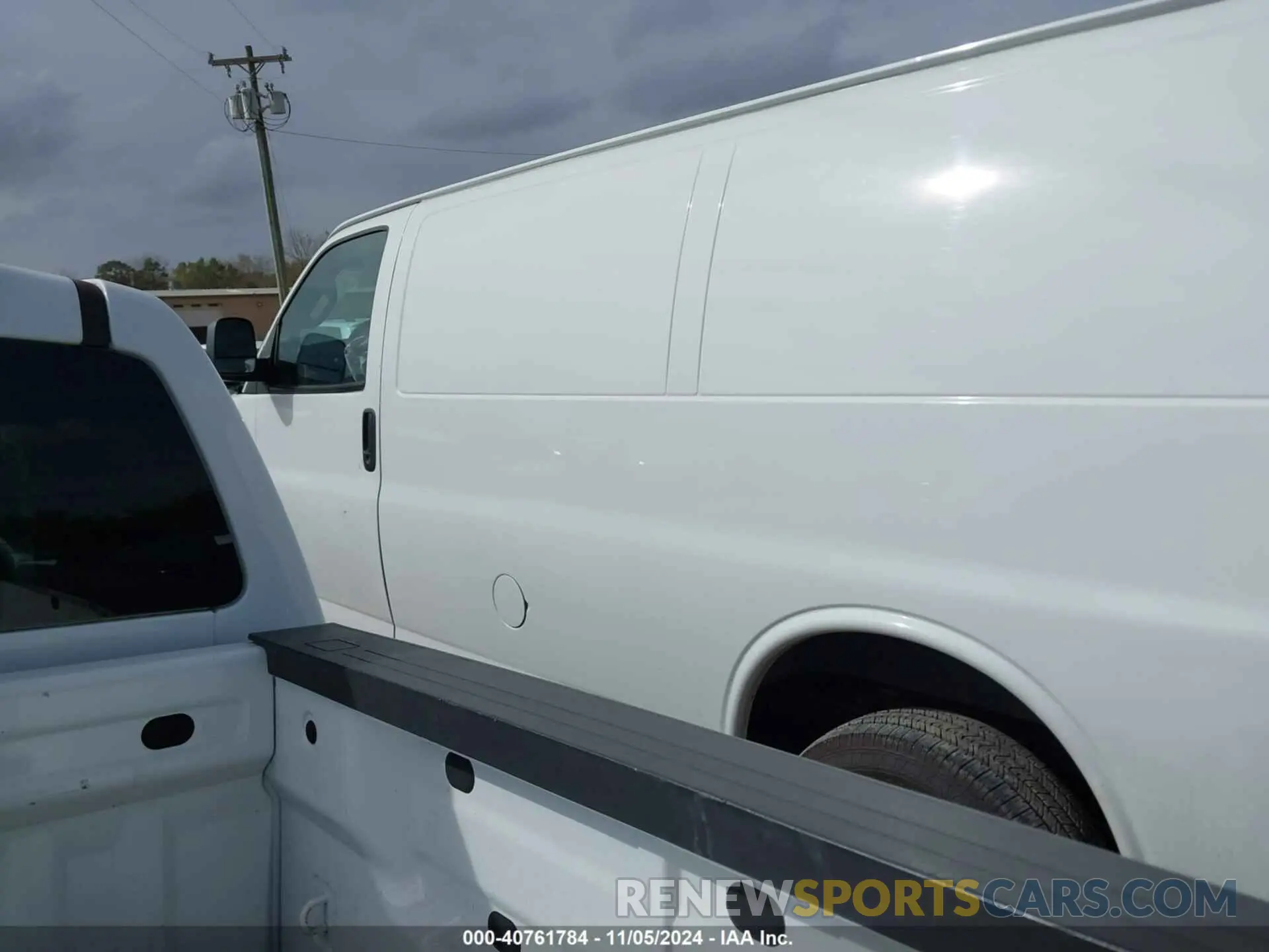 14 Photograph of a damaged car 1GCWGAFP4M1256853 CHEVROLET EXPRESS CARGO 2021