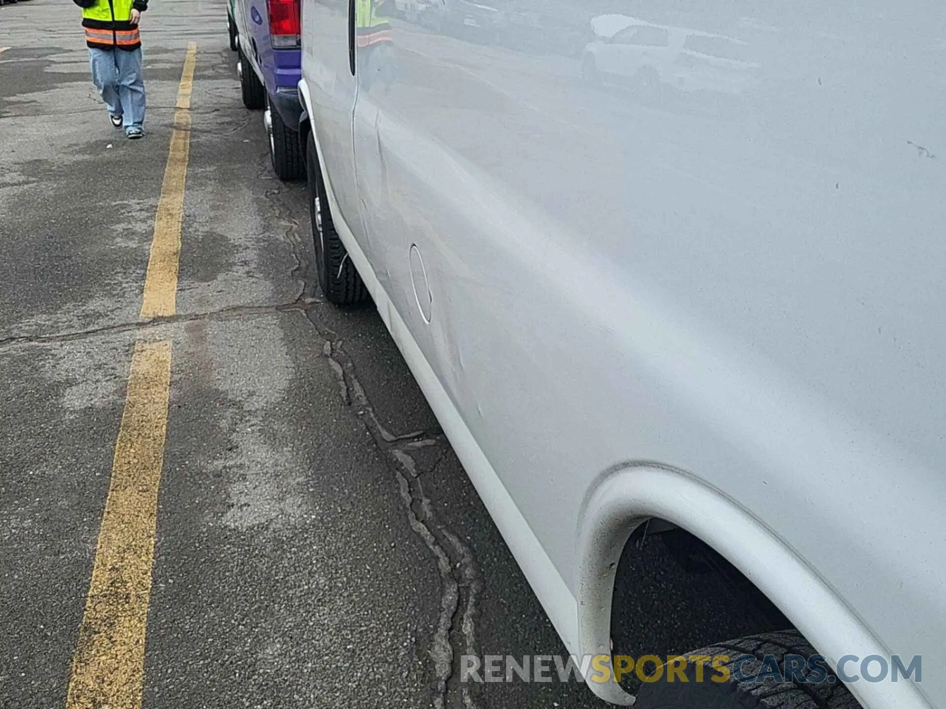 50 Photograph of a damaged car 1GCZGGFP2K1329702 CHEVROLET EXPRESS G3500 2019