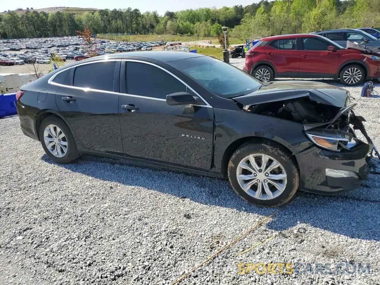 4 Фотография поврежденного автомобиля 1G1ZD5STXLF112802 CHEVROLET MALIBU 2020