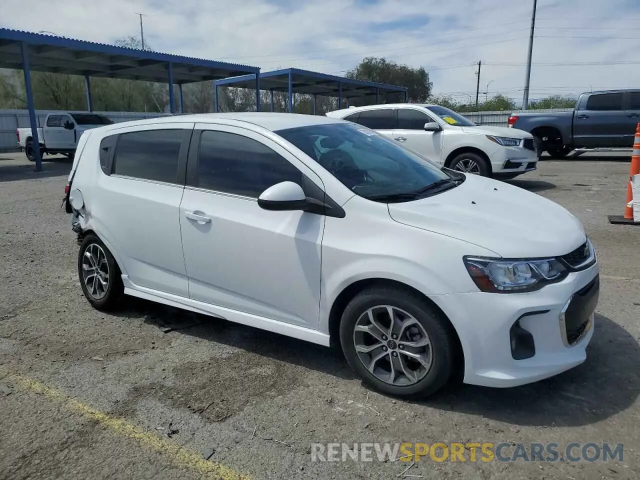 4 Photograph of a damaged car 1G1JD6SB5K4125008 CHEVROLET SONIC 2019