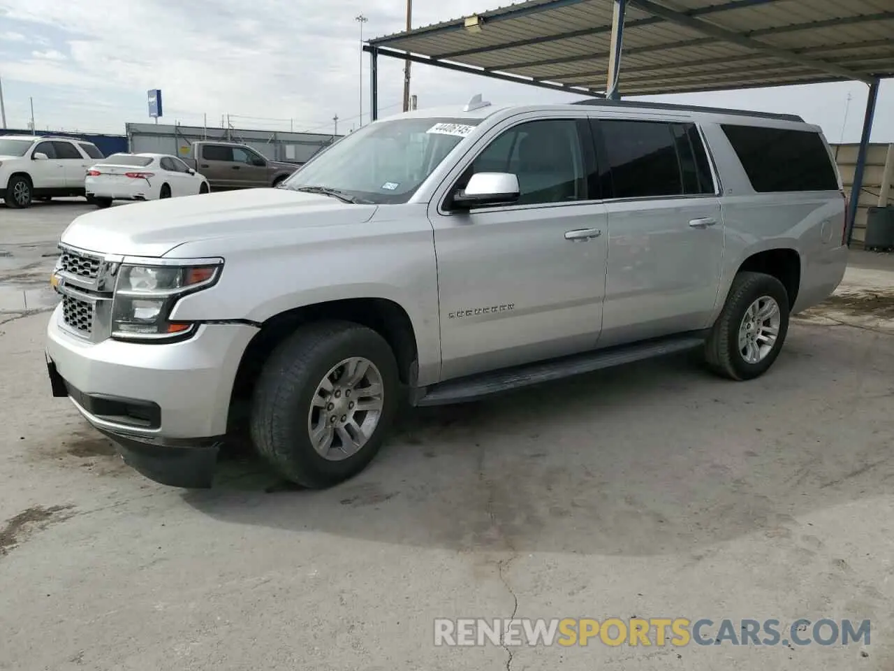 1 Photograph of a damaged car 1GNSCHKC2KR242459 CHEVROLET SUBURBAN 2019