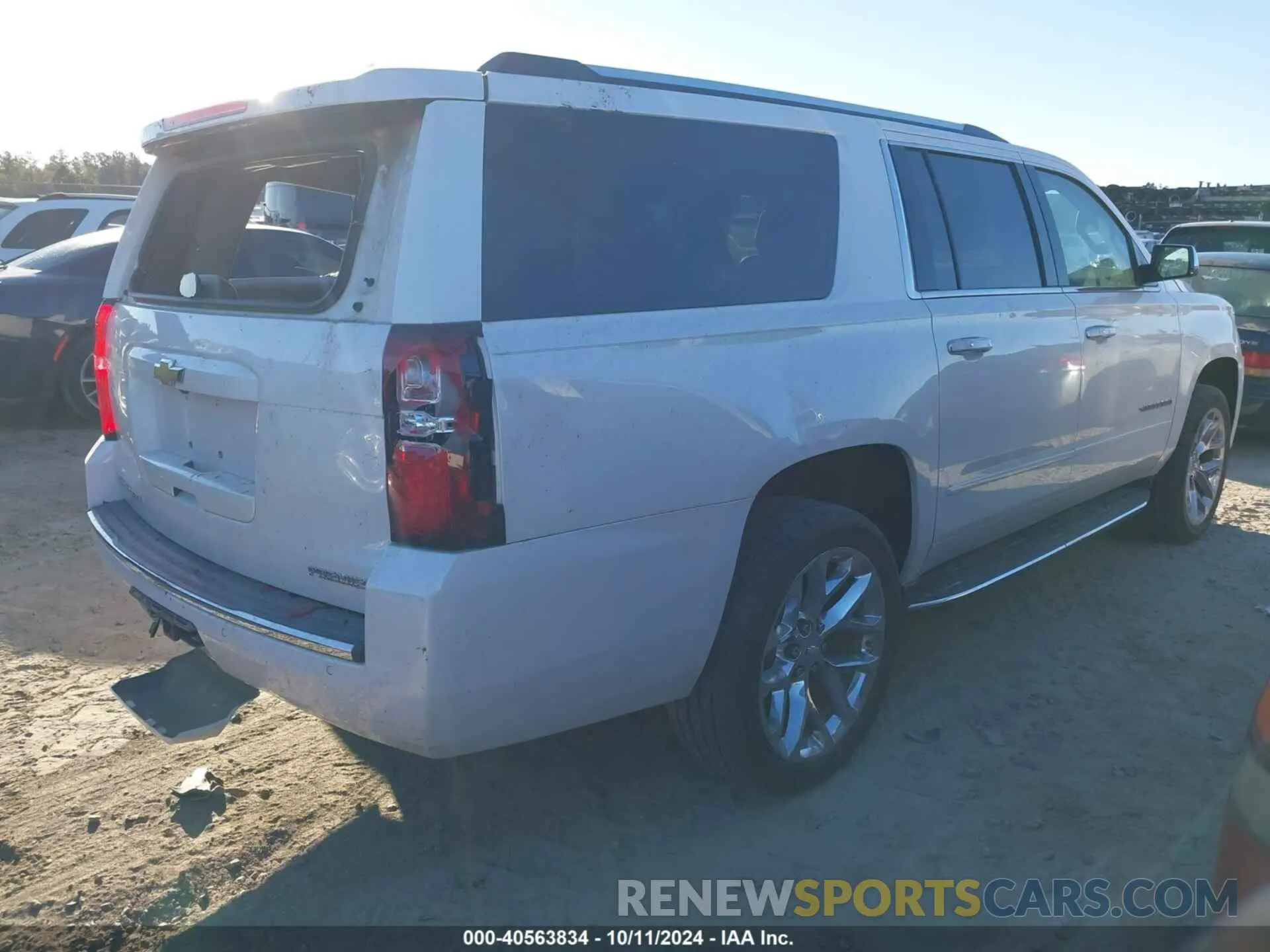 4 Photograph of a damaged car 1GNSCJKC0KR293658 CHEVROLET SUBURBAN 2019