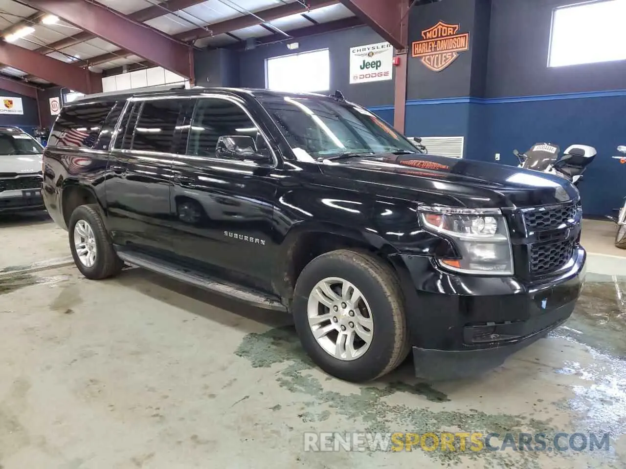 4 Photograph of a damaged car 1GNSKHKC1KR129573 CHEVROLET SUBURBAN 2019