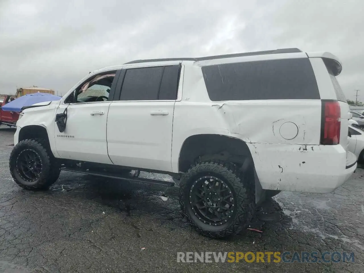 2 Photograph of a damaged car 1GNSKHKC5KR315150 CHEVROLET SUBURBAN 2019