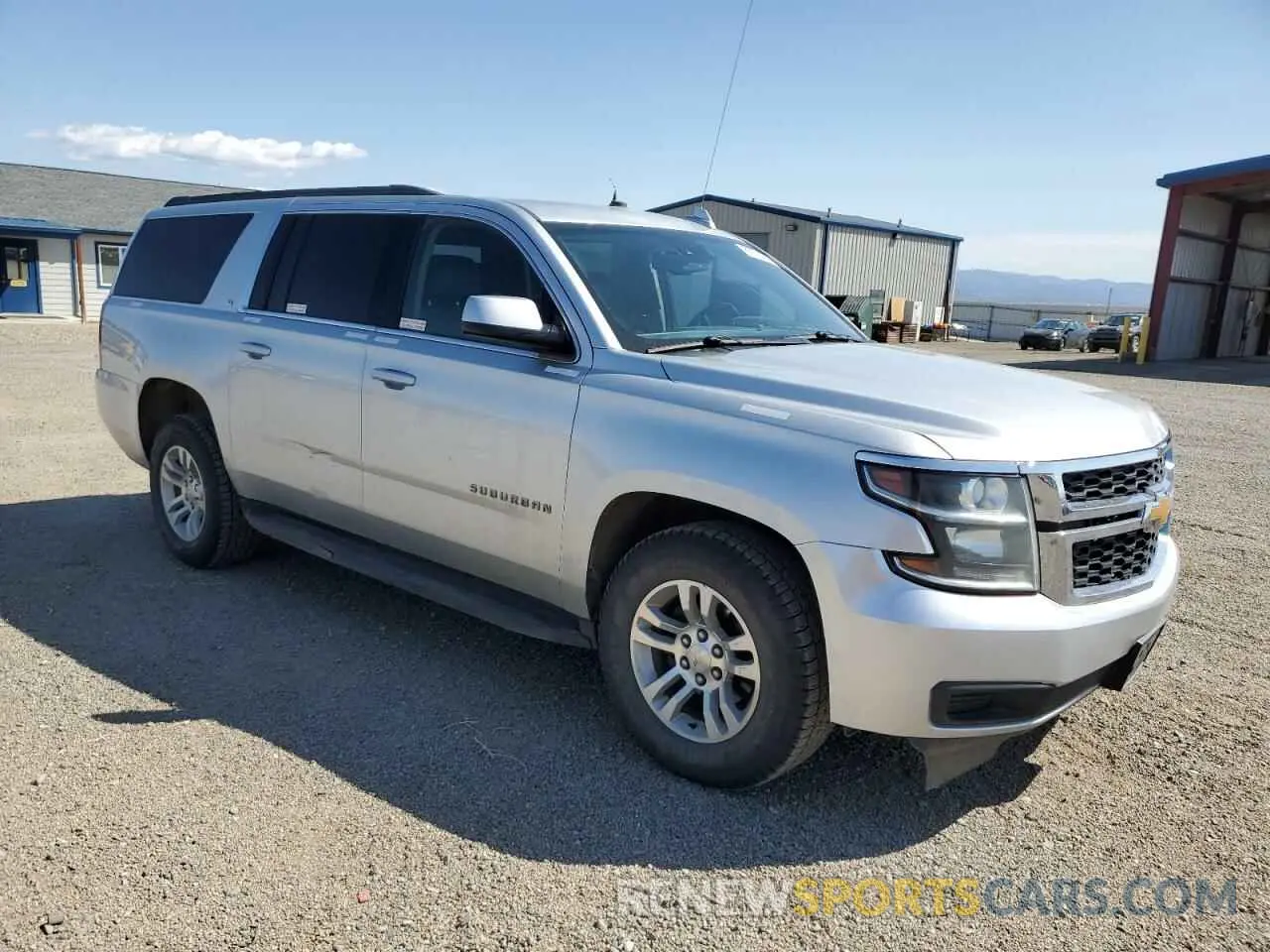 4 Photograph of a damaged car 1GNSKHKC8KR402413 CHEVROLET SUBURBAN 2019