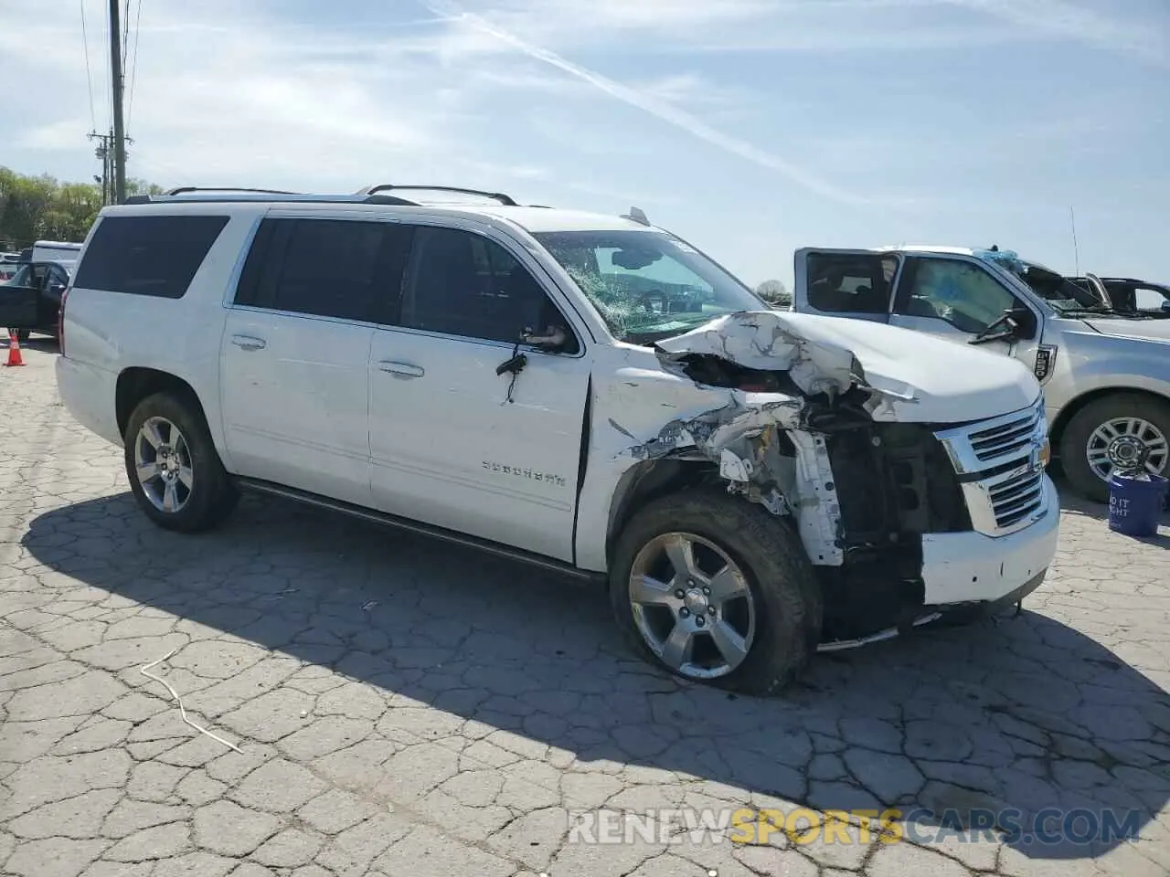 4 Photograph of a damaged car 1GNSKJKC0LR151444 CHEVROLET SUBURBAN 2020