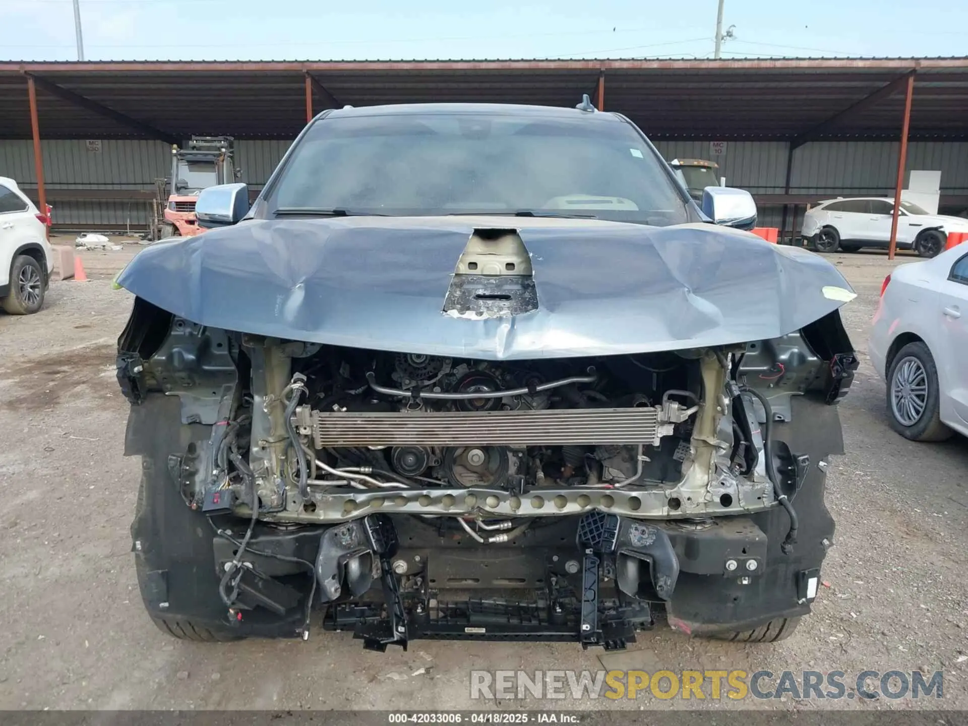 12 Photograph of a damaged car 1GNSKFKDXMR295929 CHEVROLET SUBURBAN 2021