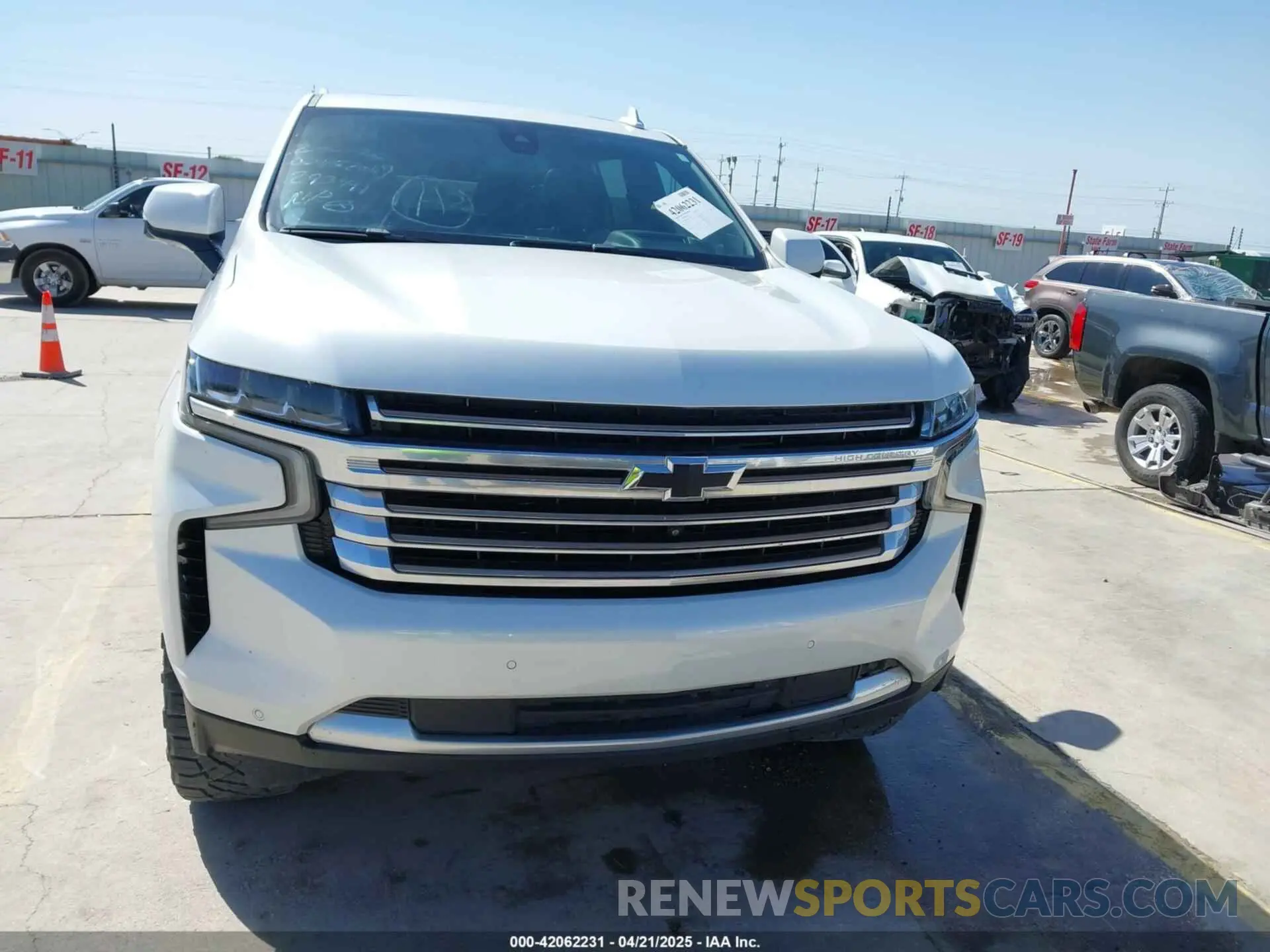 12 Photograph of a damaged car 1GNSKGKLXMR293496 CHEVROLET SUBURBAN 2021