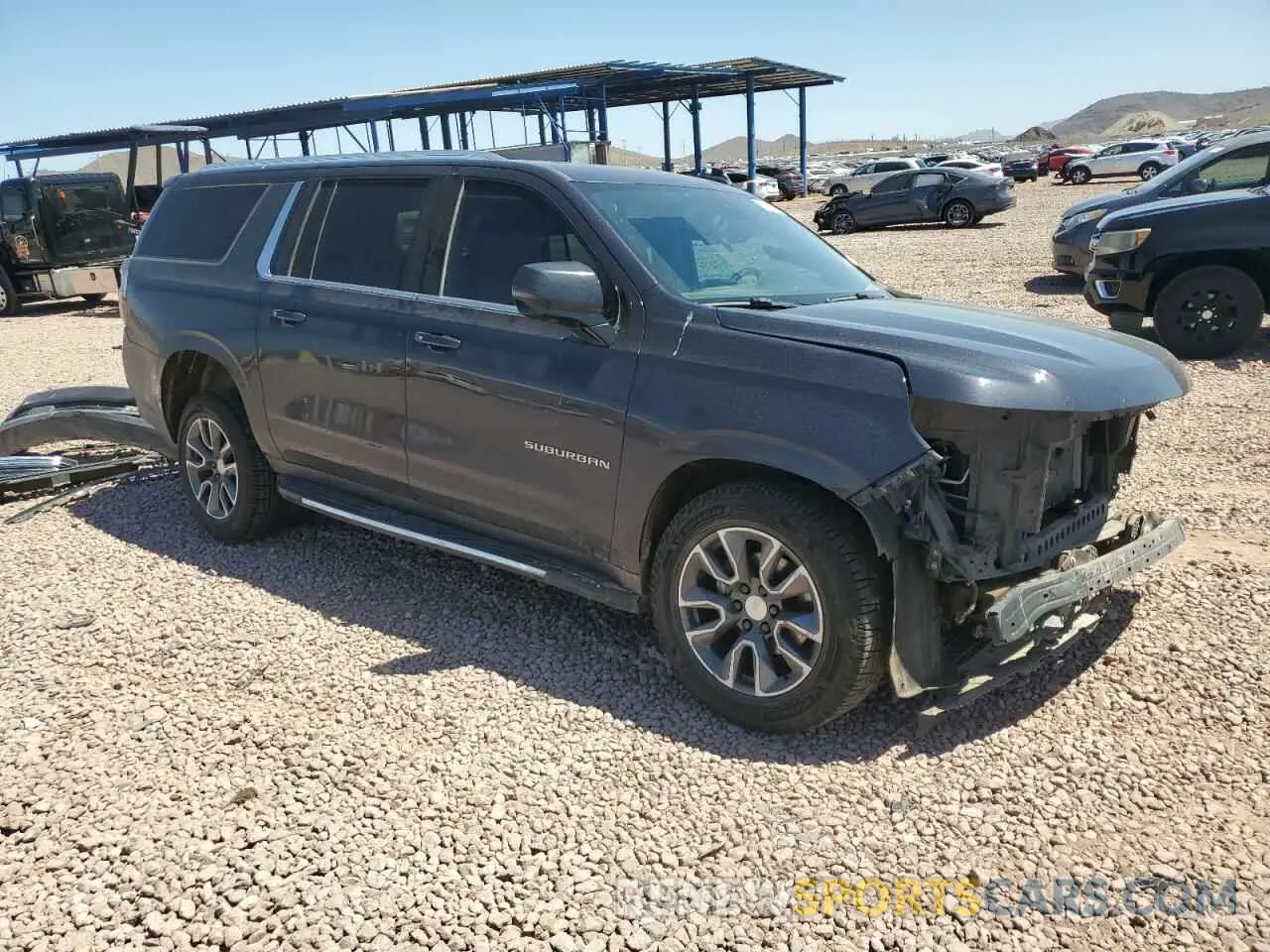 4 Photograph of a damaged car 1GNSKCKDXNR317511 CHEVROLET SUBURBAN 2022