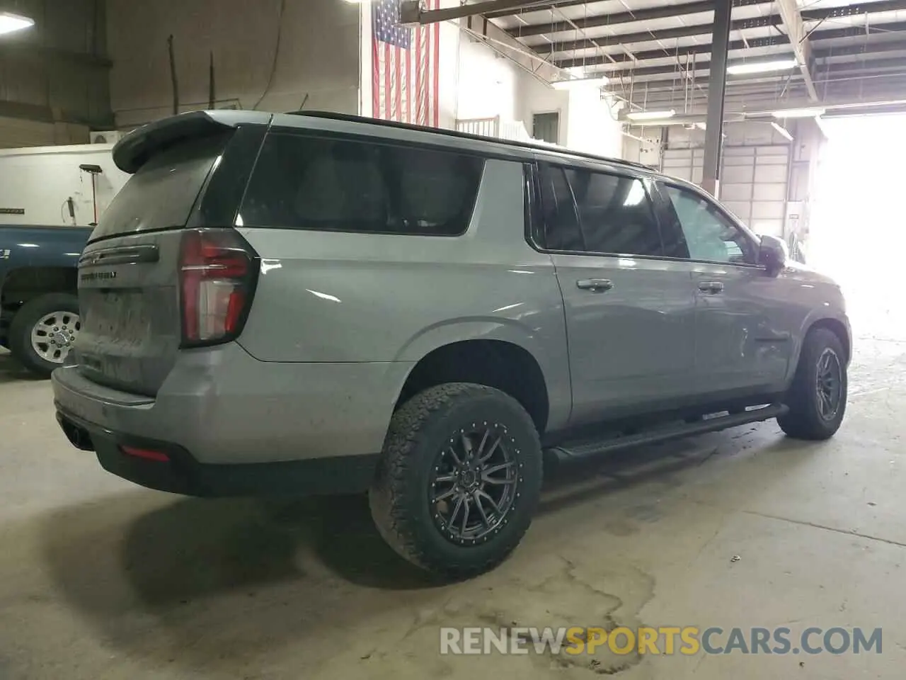 3 Photograph of a damaged car 1GNSKDKD3PR208977 CHEVROLET SUBURBAN 2023