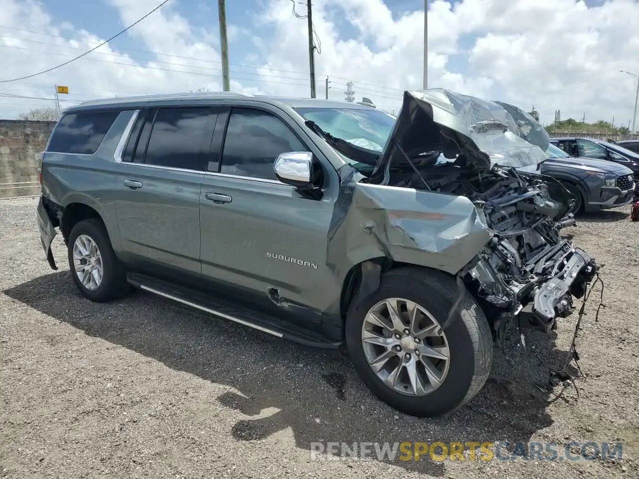 4 Photograph of a damaged car 1GNSKFKD8PR390204 CHEVROLET SUBURBAN 2023