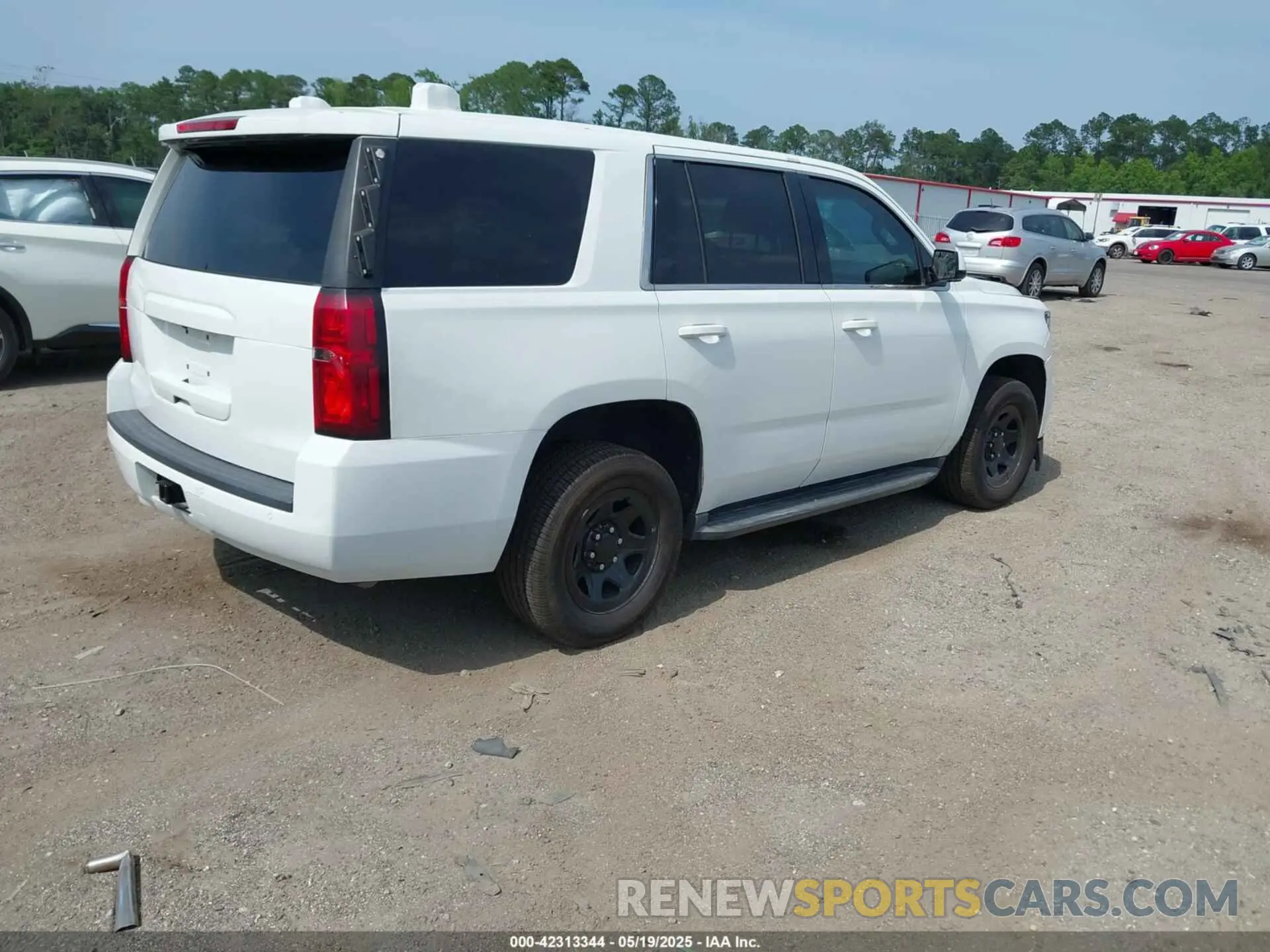 4 Photograph of a damaged car 1GNLCDEC5KR205415 CHEVROLET TAHOE 2019