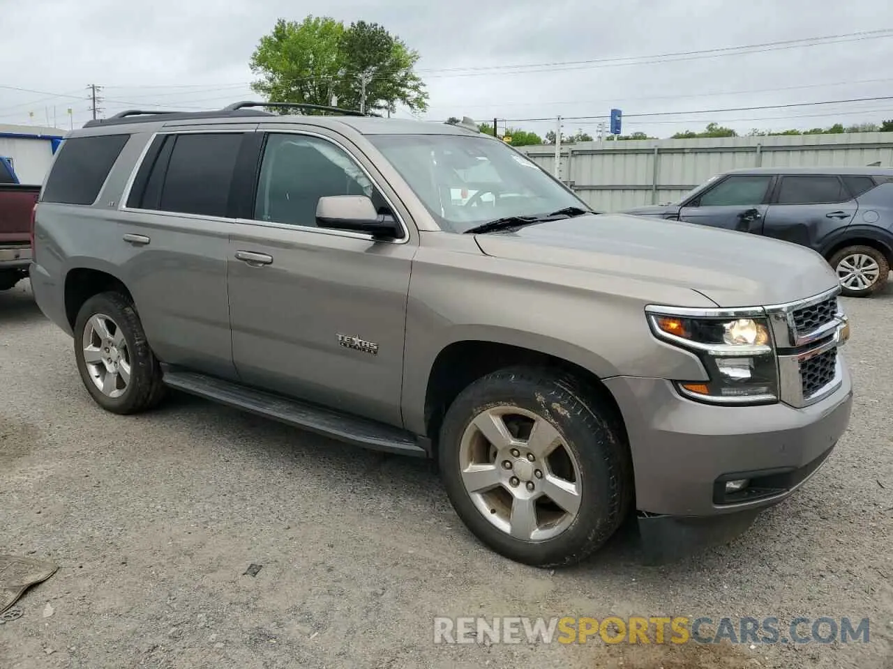 4 Photograph of a damaged car 1GNSCBKC1KR168030 CHEVROLET TAHOE 2019