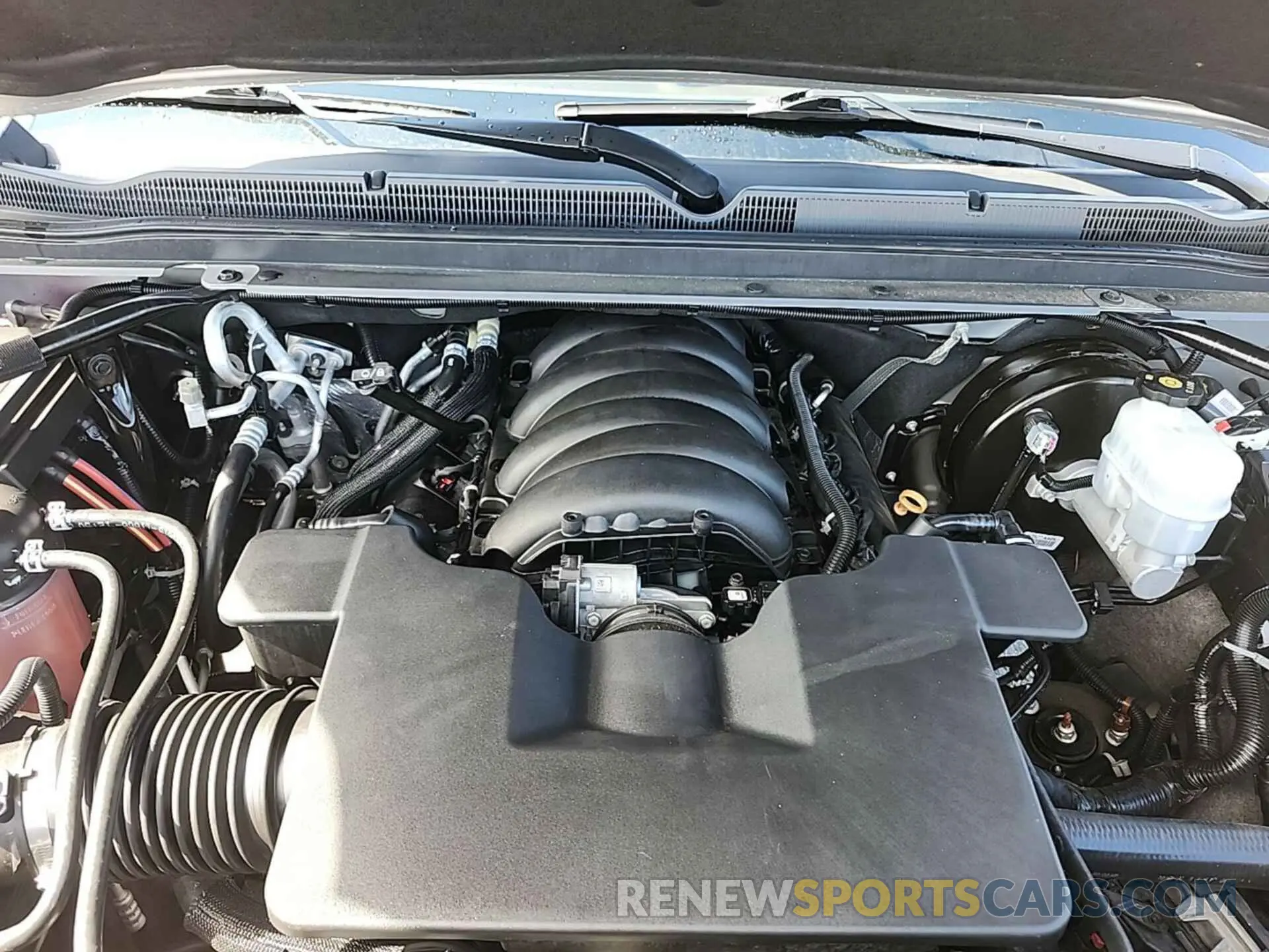 24 Photograph of a damaged car 1GNSCBKC7KR268973 CHEVROLET TAHOE 2019
