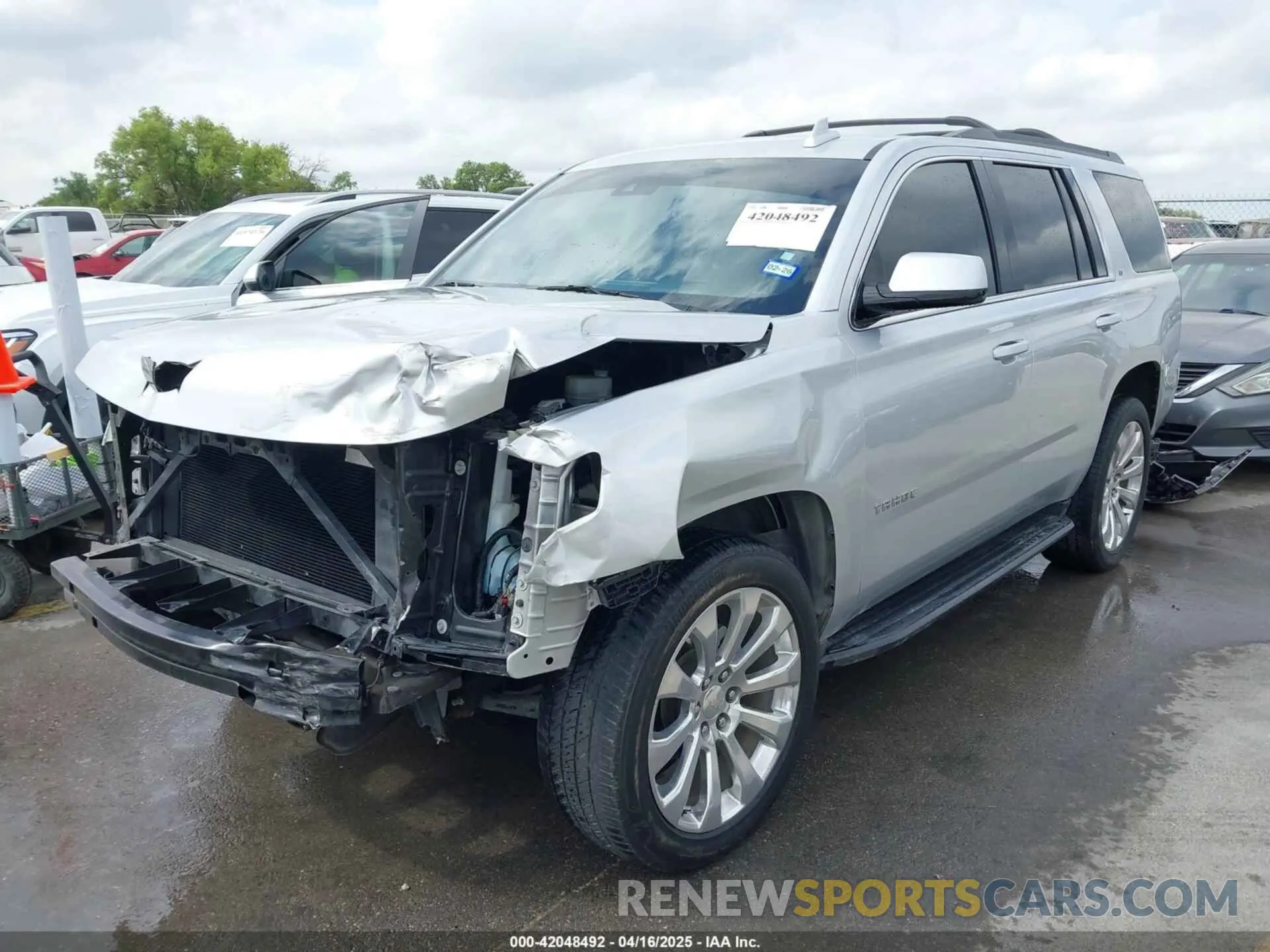 2 Photograph of a damaged car 1GNSCBKC7KR326466 CHEVROLET TAHOE 2019
