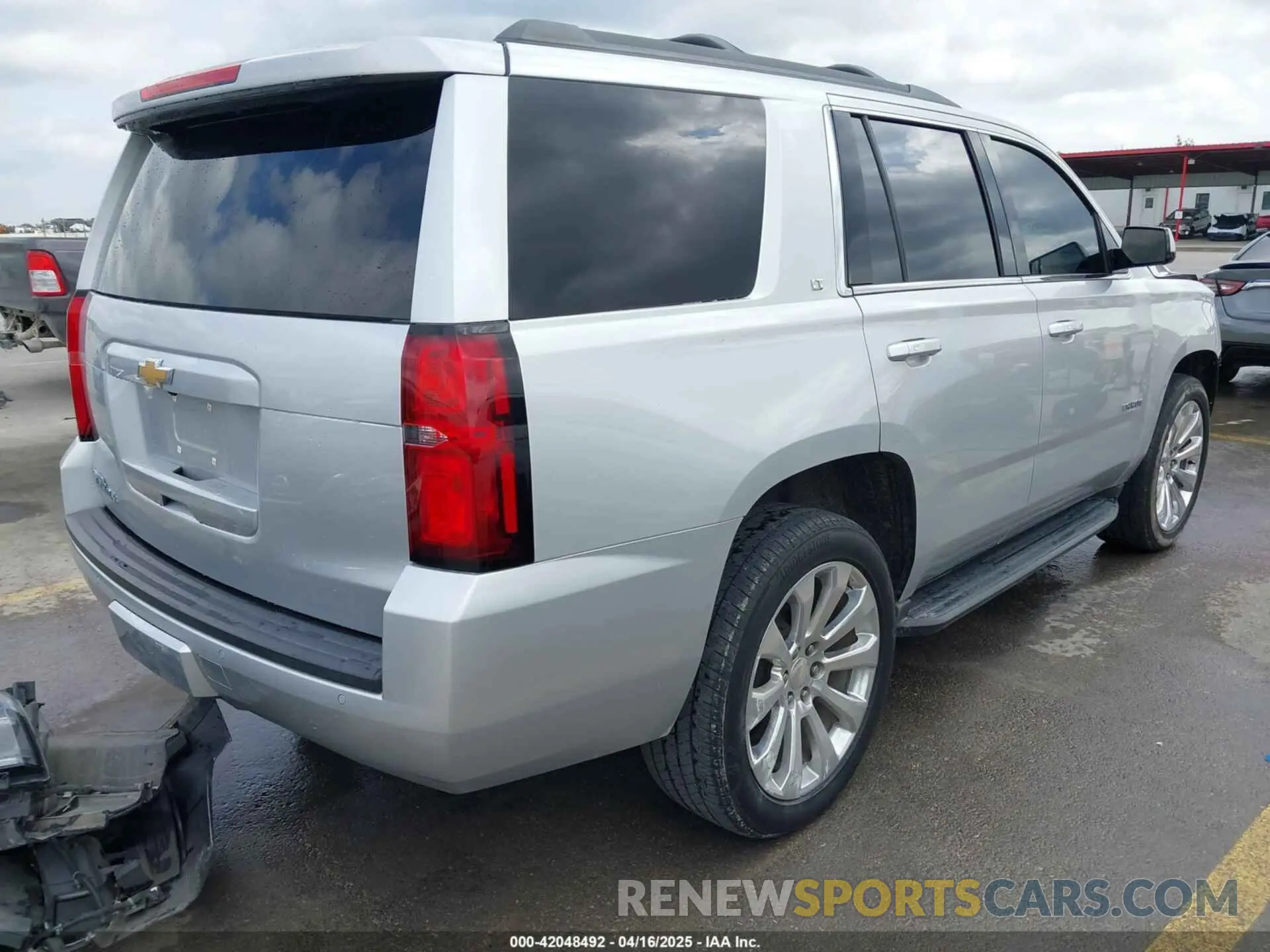 4 Photograph of a damaged car 1GNSCBKC7KR326466 CHEVROLET TAHOE 2019