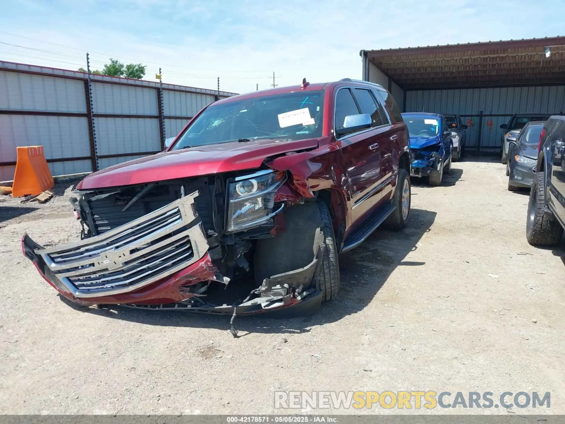 2 Photograph of a damaged car 1GNSCCKC2KR173999 CHEVROLET TAHOE 2019