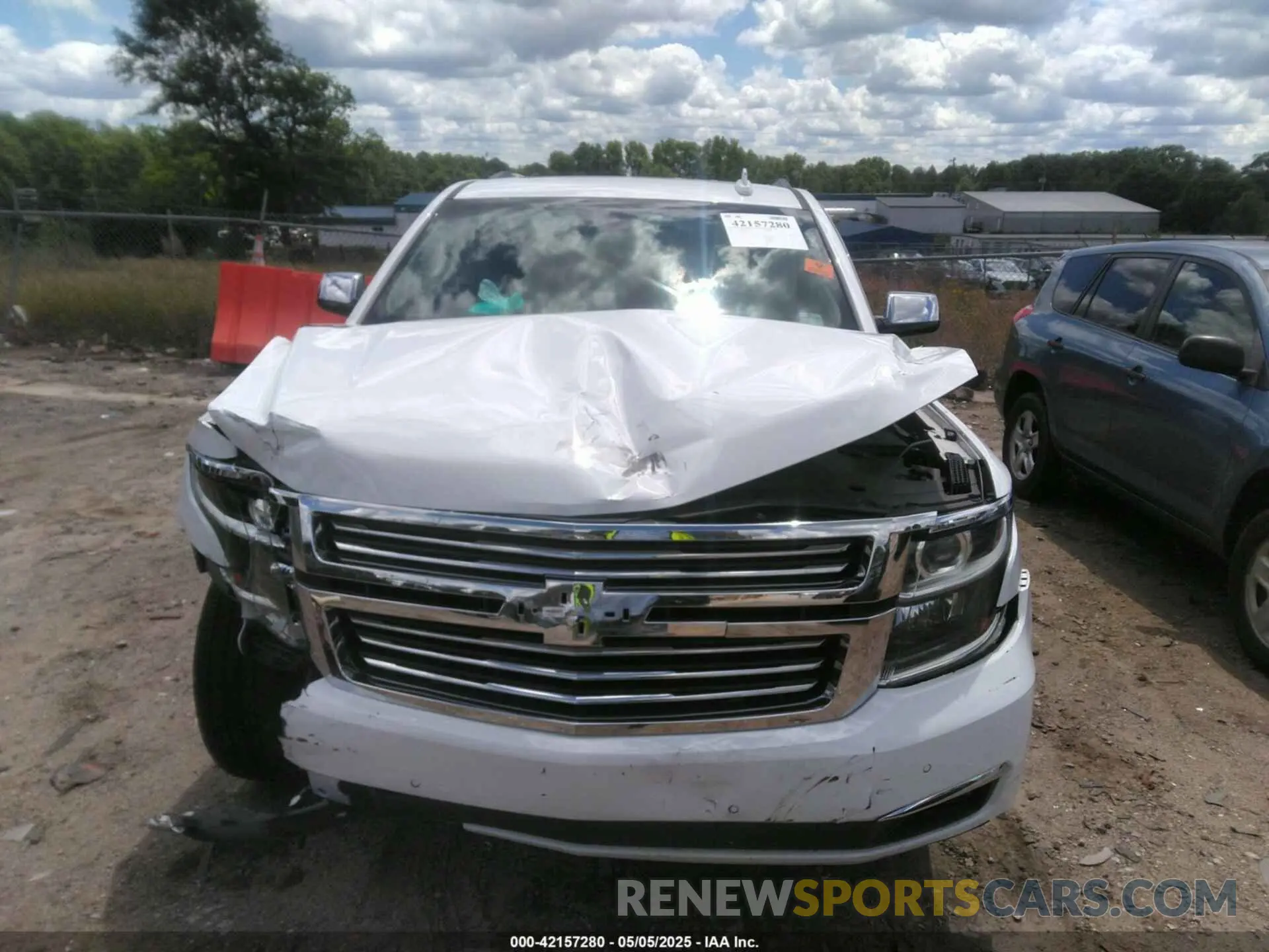 12 Photograph of a damaged car 1GNSCCKC6KR105463 CHEVROLET TAHOE 2019
